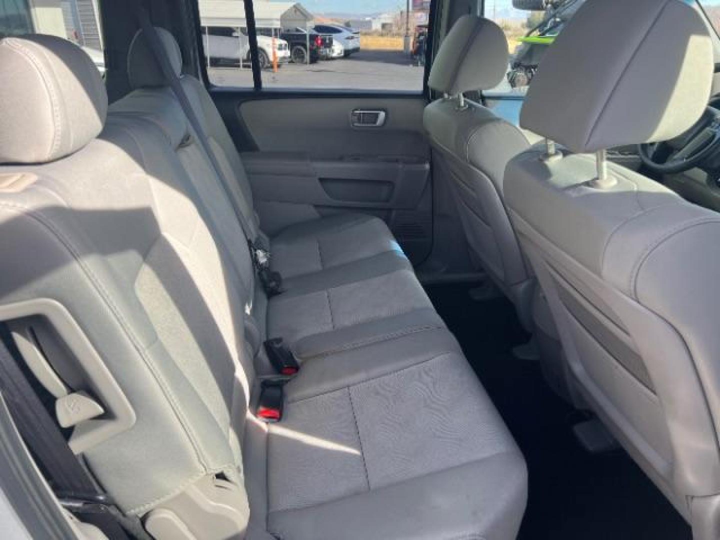 2011 Alabaster Silver Metallic /Black Cloth Interior Honda Pilot LX 2WD 5-Spd AT (5FNYF3H25BB) with an 3.5L V6 SOHC 24V engine, 5-Speed Automatic transmission, located at 1865 East Red Hills Pkwy, St. George, 84770, (435) 628-0023, 37.120850, -113.543640 - We specialize in helping ALL people get the best financing available. No matter your credit score, good, bad or none we can get you an amazing rate. Had a bankruptcy, divorce, or repossessions? We give you the green light to get your credit back on the road. Low down and affordable payments that fit - Photo#32