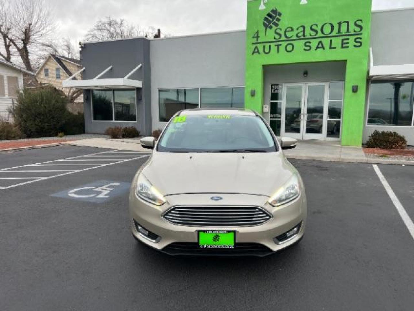 2018 White Gold Metallic /Medium Soft Ceramic, leather Ford Focus Titanium Sedan (1FADP3J27JL) with an 2.0L L4 DOHC 16V engine, 6-Speed Automatic transmission, located at 940 North Main Street, Cedar City, UT, 84720, (435) 628-0023, 37.692936, -113.061897 - We specialize in helping ALL people get the best financing available. No matter your credit score, good, bad or none we can get you an amazing rate. Had a bankruptcy, divorce, or repossessions? We give you the green light to get your credit back on the road. Low down and affordable payments that fit - Photo#1