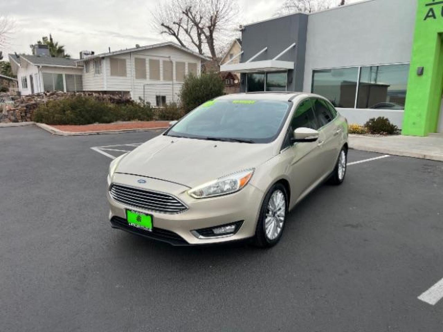 2018 White Gold Metallic /Medium Soft Ceramic, leather Ford Focus Titanium Sedan (1FADP3J27JL) with an 2.0L L4 DOHC 16V engine, 6-Speed Automatic transmission, located at 940 North Main Street, Cedar City, UT, 84720, (435) 628-0023, 37.692936, -113.061897 - We specialize in helping ALL people get the best financing available. No matter your credit score, good, bad or none we can get you an amazing rate. Had a bankruptcy, divorce, or repossessions? We give you the green light to get your credit back on the road. Low down and affordable payments that fit - Photo#2