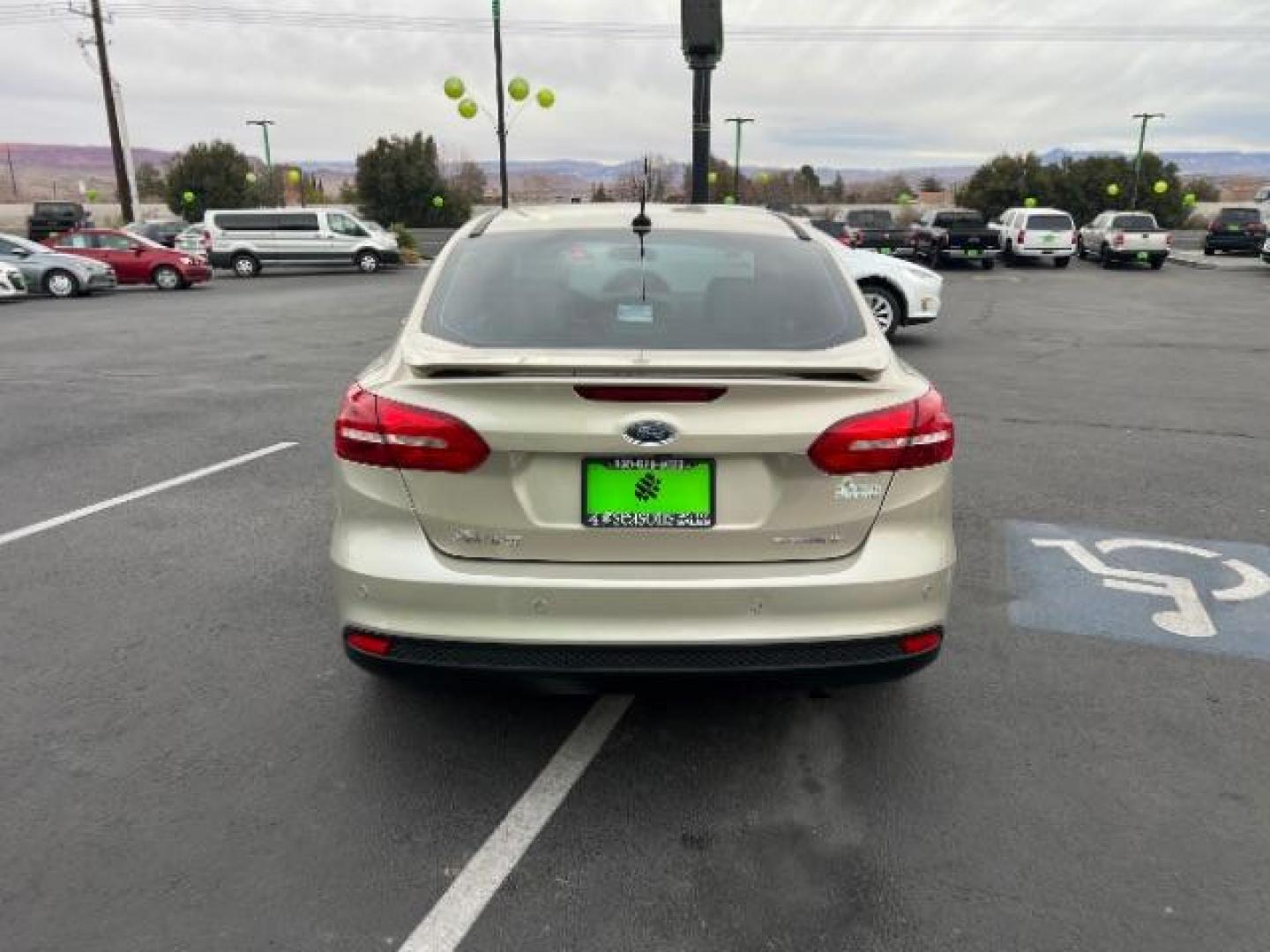 2018 White Gold Metallic /Medium Soft Ceramic, leather Ford Focus Titanium Sedan (1FADP3J27JL) with an 2.0L L4 DOHC 16V engine, 6-Speed Automatic transmission, located at 940 North Main Street, Cedar City, UT, 84720, (435) 628-0023, 37.692936, -113.061897 - We specialize in helping ALL people get the best financing available. No matter your credit score, good, bad or none we can get you an amazing rate. Had a bankruptcy, divorce, or repossessions? We give you the green light to get your credit back on the road. Low down and affordable payments that fit - Photo#5