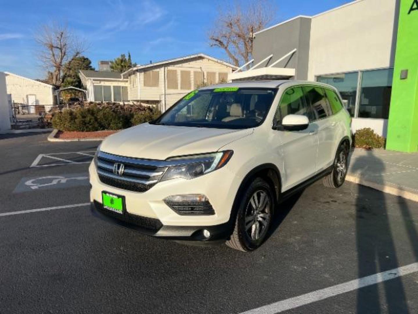 2016 White Diamond Pearl /Gray, leather Honda Pilot EXL 2WD (5FNYF5H51GB) with an 3.5L V6 SOHC 24V engine, 6-Speed Automatic transmission, located at 1865 East Red Hills Pkwy, St. George, 84770, (435) 628-0023, 37.120850, -113.543640 - We specialize in helping ALL people get the best financing available. No matter your credit score, good, bad or none we can get you an amazing rate. Had a bankruptcy, divorce, or repossessions? We give you the green light to get your credit back on the road. Low down and affordable payments that fit - Photo#2