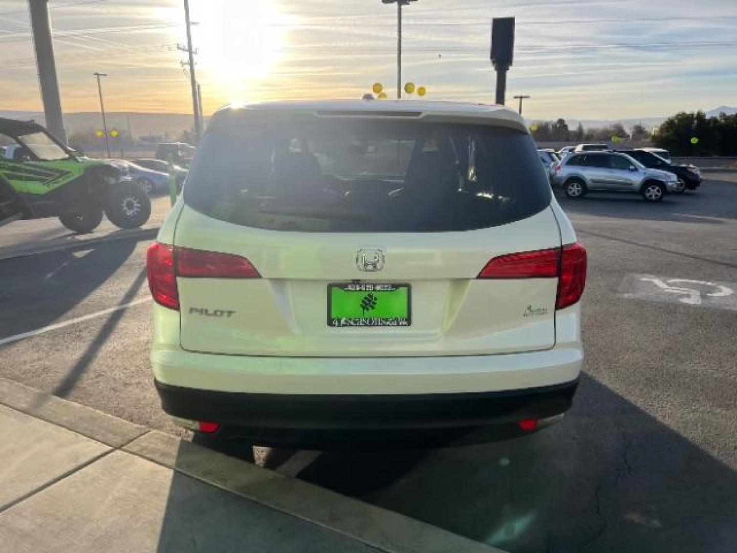 2016 White Diamond Pearl /Gray, leather Honda Pilot EXL 2WD (5FNYF5H51GB) with an 3.5L V6 SOHC 24V engine, 6-Speed Automatic transmission, located at 1865 East Red Hills Pkwy, St. George, 84770, (435) 628-0023, 37.120850, -113.543640 - We specialize in helping ALL people get the best financing available. No matter your credit score, good, bad or none we can get you an amazing rate. Had a bankruptcy, divorce, or repossessions? We give you the green light to get your credit back on the road. Low down and affordable payments that fit - Photo#5