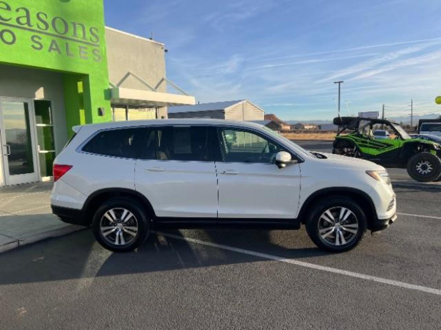 2016 White Diamond Pearl /Gray, leather Honda Pilot EXL 2WD (5FNYF5H51GB) with an 3.5L V6 SOHC 24V engine, 6-Speed Automatic transmission, located at 1865 East Red Hills Pkwy, St. George, 84770, (435) 628-0023, 37.120850, -113.543640 - We specialize in helping ALL people get the best financing available. No matter your credit score, good, bad or none we can get you an amazing rate. Had a bankruptcy, divorce, or repossessions? We give you the green light to get your credit back on the road. Low down and affordable payments that fit - Photo#7