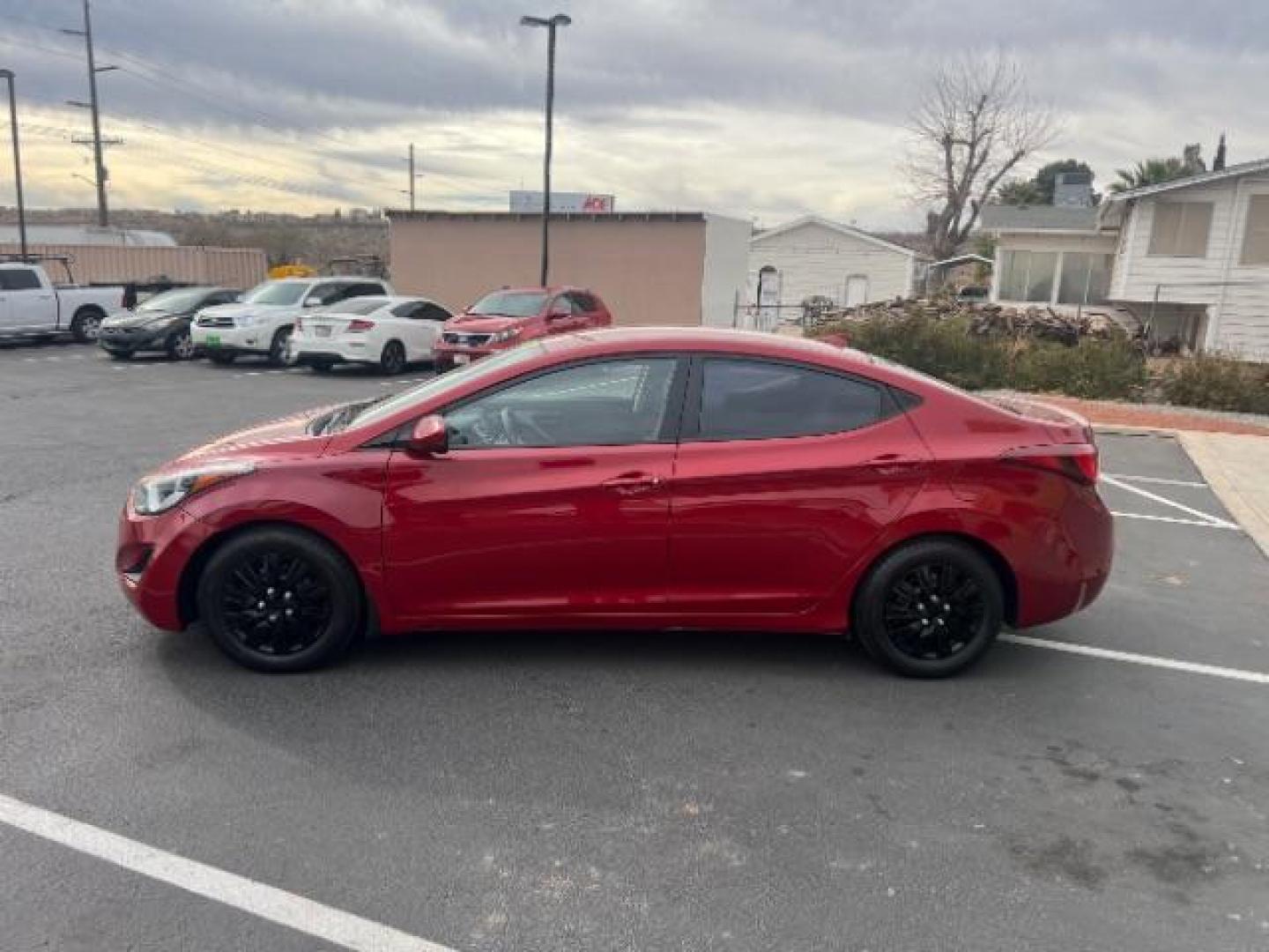 2016 Geranium Red /Black Leather, leather Hyundai Elantra Limited (KMHDH4AE5GU) with an 1.8L L4 DOHC 16V engine, 6-Speed Automatic transmission, located at 940 North Main Street, Cedar City, UT, 84720, (435) 628-0023, 37.692936, -113.061897 - We specialize in helping ALL people get the best financing available. No matter your credit score, good, bad or none we can get you an amazing rate. Had a bankruptcy, divorce, or repossessions? We give you the green light to get your credit back on the road. Low down and affordable payments that fit - Photo#3