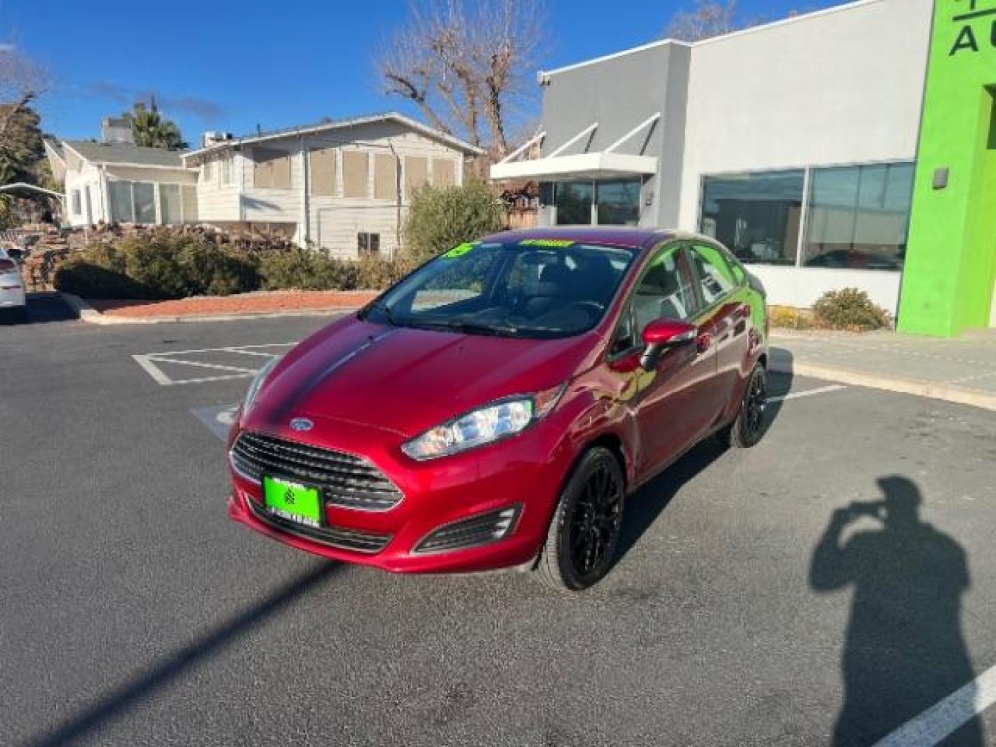 2015 Ruby Red Met Tinted CC /Charcoal Black w/Silver Ford Fiesta SE Sedan (3FADP4BJ0FM) with an 1.6L L4 DOHC 16V engine, 6-Speed Automatic transmission, located at 940 North Main Street, Cedar City, UT, 84720, (435) 628-0023, 37.692936, -113.061897 - We specialize in helping ALL people get the best financing available. No matter your credit score, good, bad or none we can get you an amazing rate. Had a bankruptcy, divorce, or repossessions? We give you the green light to get your credit back on the road. Low down and affordable payments that fit - Photo#2