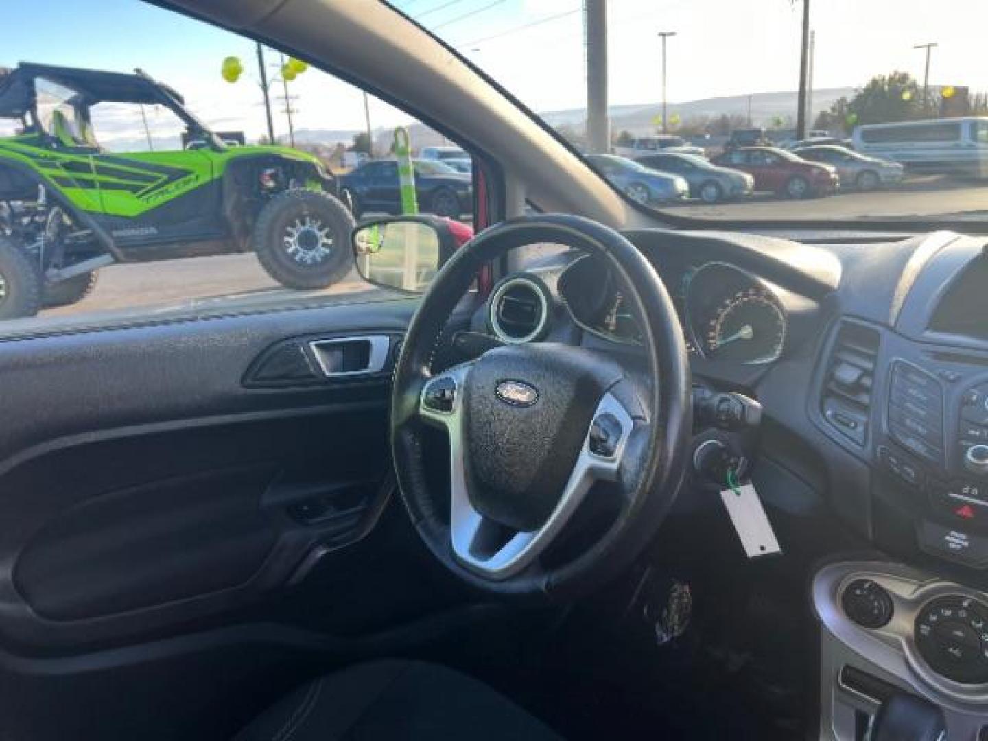 2015 Ruby Red Met Tinted CC /Charcoal Black w/Silver Ford Fiesta SE Sedan (3FADP4BJ0FM) with an 1.6L L4 DOHC 16V engine, 6-Speed Automatic transmission, located at 940 North Main Street, Cedar City, UT, 84720, (435) 628-0023, 37.692936, -113.061897 - We specialize in helping ALL people get the best financing available. No matter your credit score, good, bad or none we can get you an amazing rate. Had a bankruptcy, divorce, or repossessions? We give you the green light to get your credit back on the road. Low down and affordable payments that fit - Photo#32