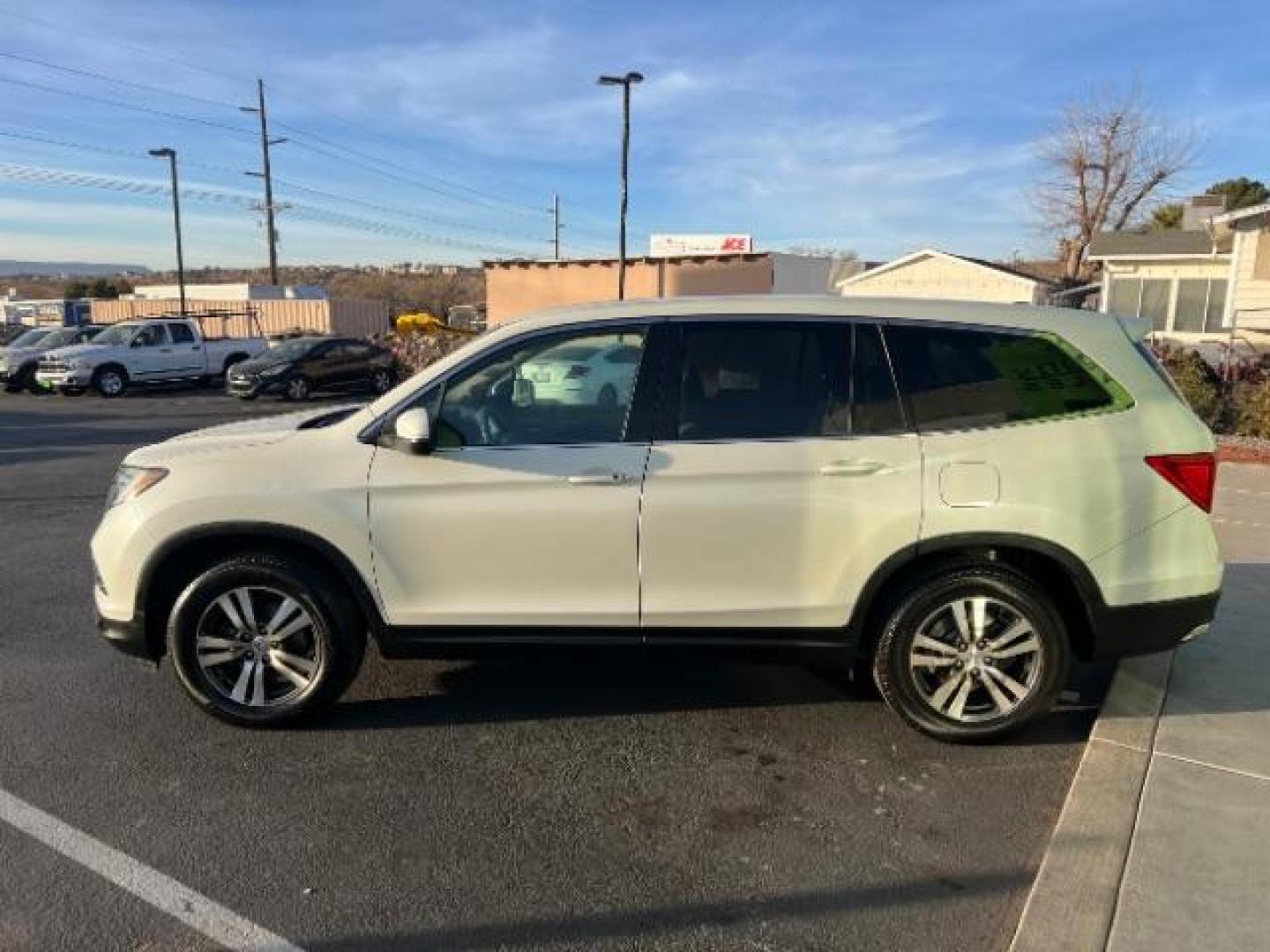 2016 White Diamond Pearl /Gray, cloth Honda Pilot EX 2WD (5FNYF5H35GB) with an 3.5L V6 SOHC 24V engine, 6-Speed Automatic transmission, located at 940 North Main Street, Cedar City, UT, 84720, (435) 628-0023, 37.692936, -113.061897 - We specialize in helping ALL people get the best financing available. No matter your credit score, good, bad or none we can get you an amazing rate. Had a bankruptcy, divorce, or repossessions? We give you the green light to get your credit back on the road. Low down and affordable payments that fit - Photo#3