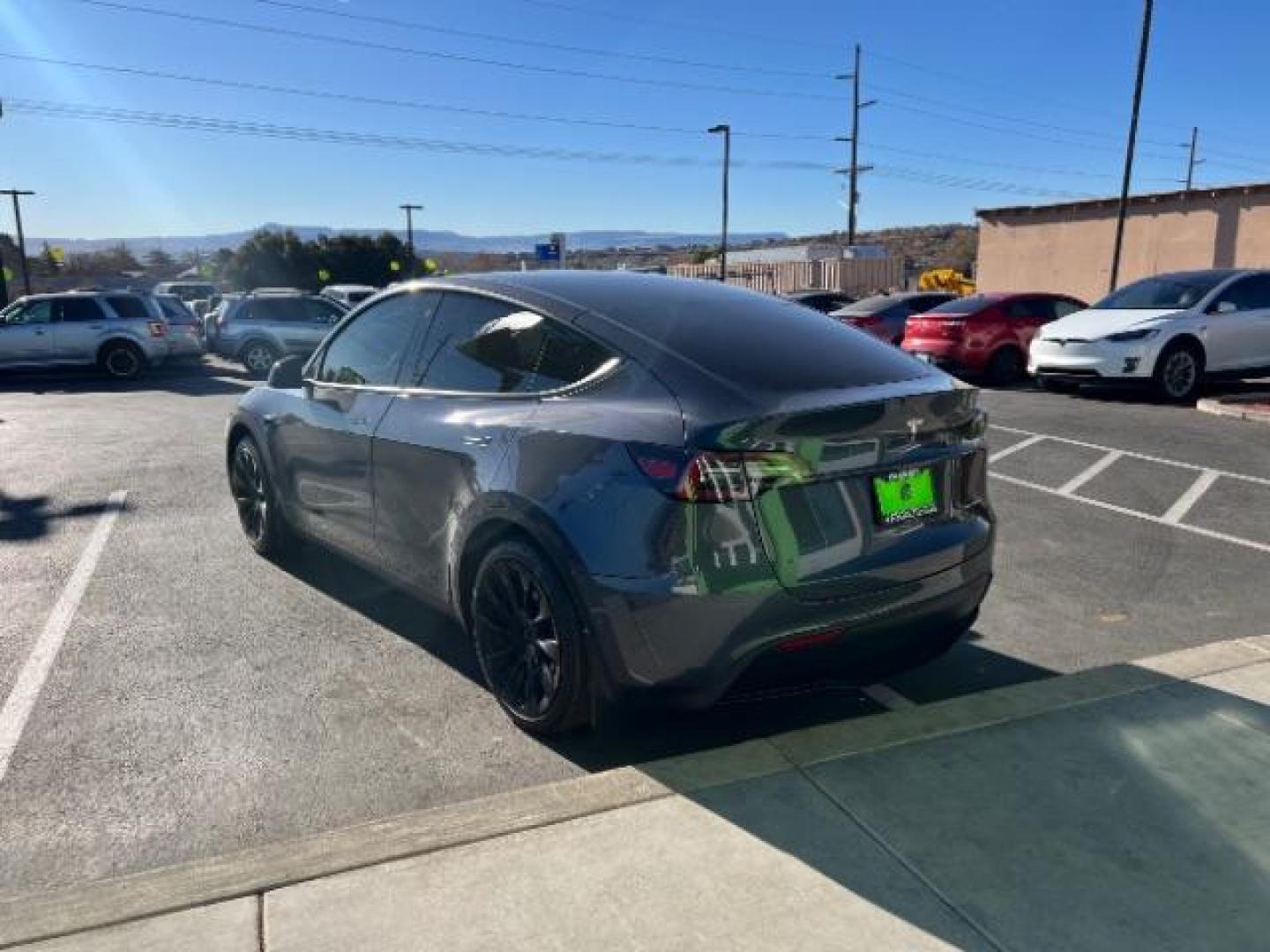 2022 Grey /Black Tesla Model Y Long Range (7SAYGAEE1NF) with an Electric engine, 1 Speed-Automatic transmission, located at 1865 East Red Hills Pkwy, St. George, 84770, (435) 628-0023, 37.120850, -113.543640 - Photo#4