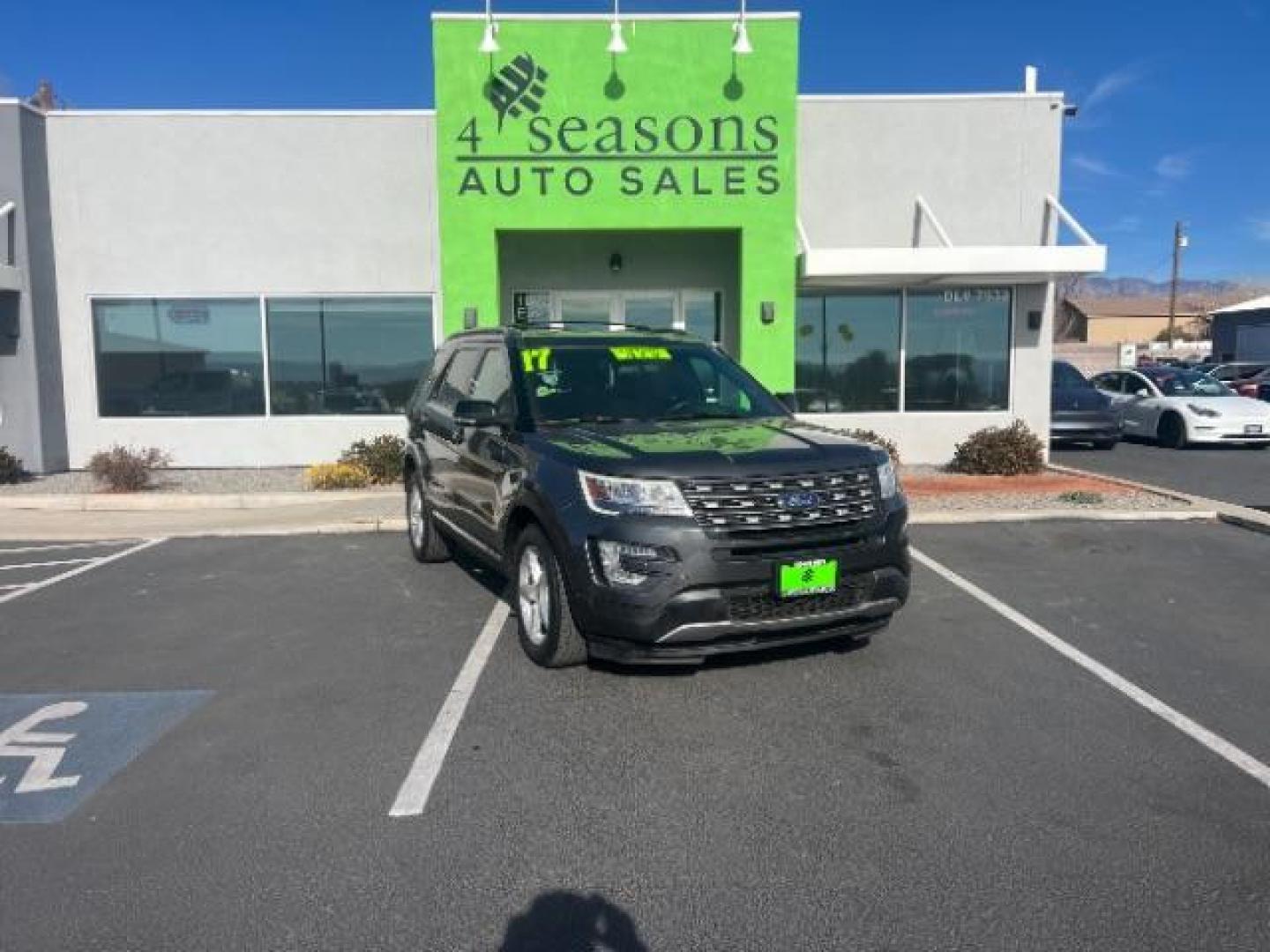 2017 Smoked Quartz Tinted Clearcoat Metallic /Dark Earth w/Ebony Black, leather/sueded microfibe Ford Explorer XLT 4WD (1FM5K8D80HG) with an 3.5L V6 DOHC 24V engine, 6-Speed Automatic transmission, located at 940 North Main Street, Cedar City, UT, 84720, (435) 628-0023, 37.692936, -113.061897 - We specialize in helping ALL people get the best financing available. No matter your credit score, good, bad or none we can get you an amazing rate. Had a bankruptcy, divorce, or repossessions? We give you the green light to get your credit back on the road. Low down and affordable payments that fit - Photo#0