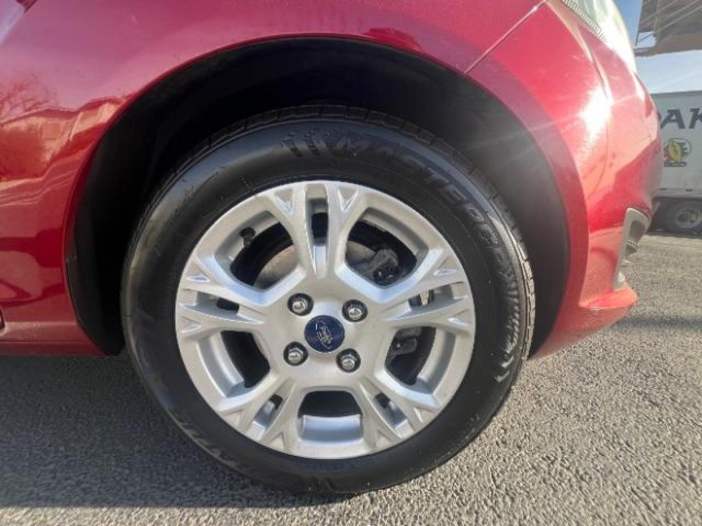 2014 Ruby Red Met Tinted CC /Charcoal Black w/Silver Ford Fiesta SE Sedan (3FADP4BJ1EM) with an 1.6L L4 DOHC 16V engine, 6-Speed Automatic transmission, located at 1865 East Red Hills Pkwy, St. George, 84770, (435) 628-0023, 37.120850, -113.543640 - We specialize in helping ALL people get the best financing available. No matter your credit score, good, bad or none we can get you an amazing rate. Had a bankruptcy, divorce, or repossessions? We give you the green light to get your credit back on the road. Low down and affordable payments that fit - Photo#10