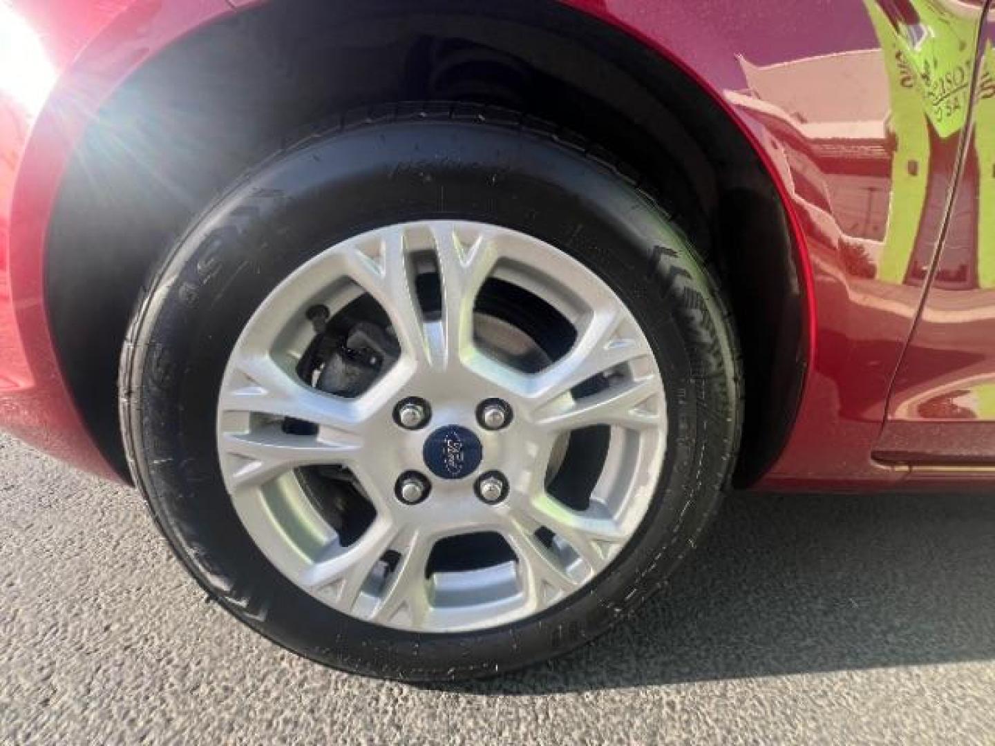 2014 Ruby Red Met Tinted CC /Charcoal Black w/Silver Ford Fiesta SE Sedan (3FADP4BJ1EM) with an 1.6L L4 DOHC 16V engine, 6-Speed Automatic transmission, located at 1865 East Red Hills Pkwy, St. George, 84770, (435) 628-0023, 37.120850, -113.543640 - We specialize in helping ALL people get the best financing available. No matter your credit score, good, bad or none we can get you an amazing rate. Had a bankruptcy, divorce, or repossessions? We give you the green light to get your credit back on the road. Low down and affordable payments that fit - Photo#11