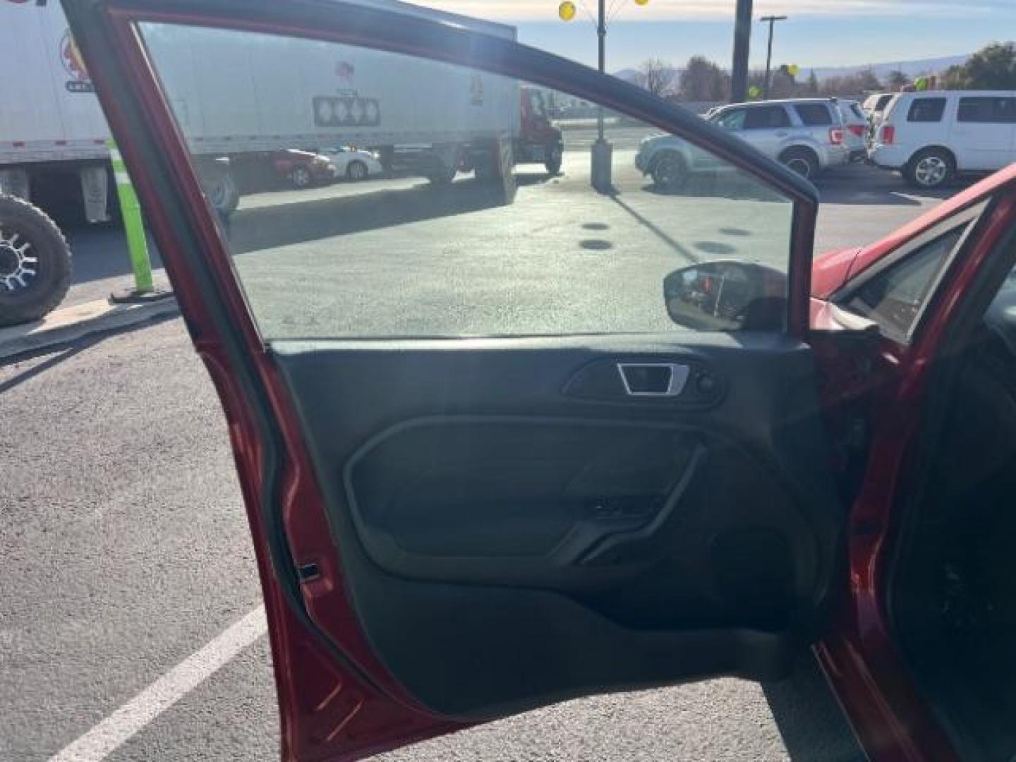 2014 Ruby Red Met Tinted CC /Charcoal Black w/Silver Ford Fiesta SE Sedan (3FADP4BJ1EM) with an 1.6L L4 DOHC 16V engine, 6-Speed Automatic transmission, located at 1865 East Red Hills Pkwy, St. George, 84770, (435) 628-0023, 37.120850, -113.543640 - We specialize in helping ALL people get the best financing available. No matter your credit score, good, bad or none we can get you an amazing rate. Had a bankruptcy, divorce, or repossessions? We give you the green light to get your credit back on the road. Low down and affordable payments that fit - Photo#13