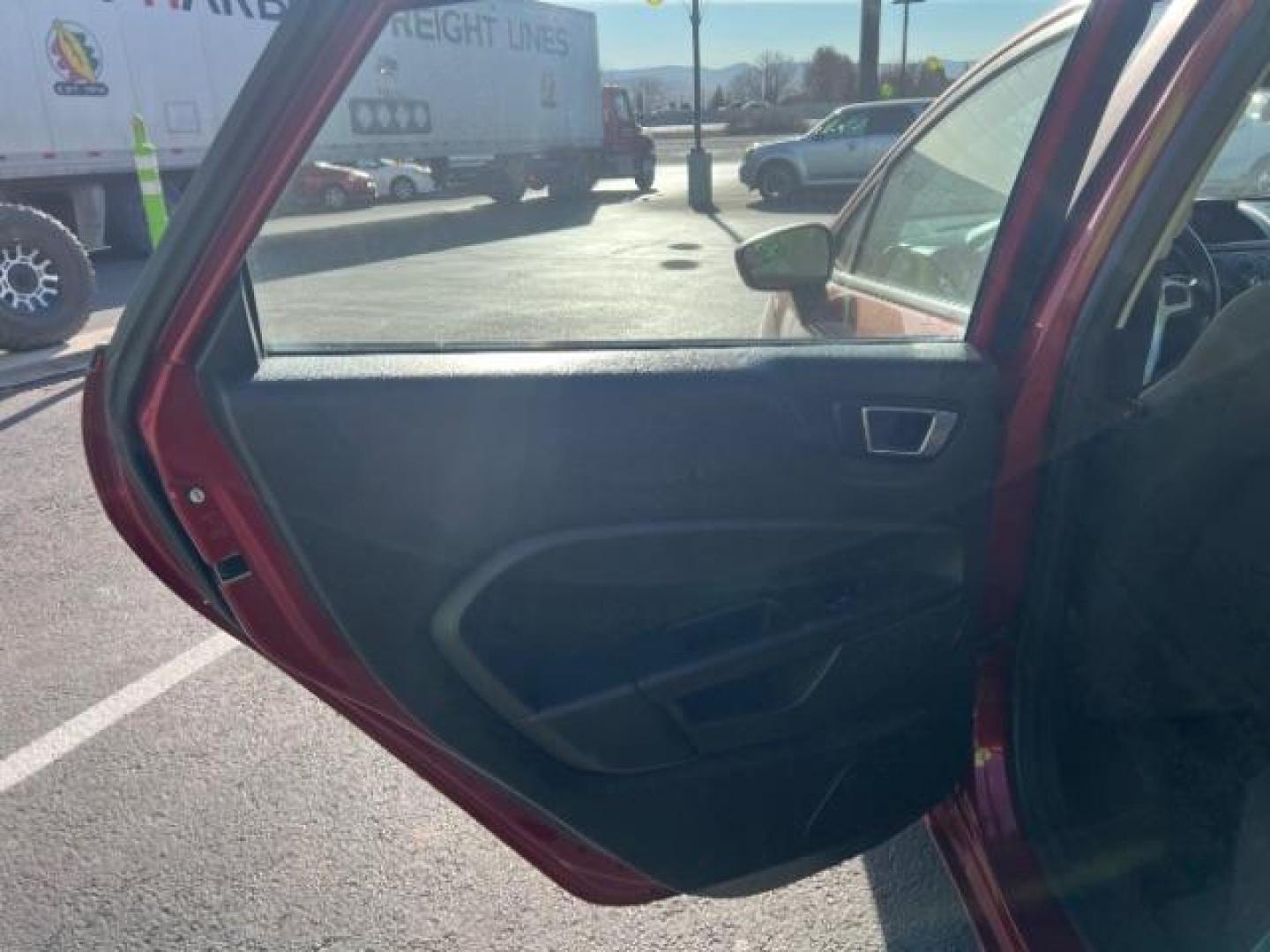 2014 Ruby Red Met Tinted CC /Charcoal Black w/Silver Ford Fiesta SE Sedan (3FADP4BJ1EM) with an 1.6L L4 DOHC 16V engine, 6-Speed Automatic transmission, located at 1865 East Red Hills Pkwy, St. George, 84770, (435) 628-0023, 37.120850, -113.543640 - We specialize in helping ALL people get the best financing available. No matter your credit score, good, bad or none we can get you an amazing rate. Had a bankruptcy, divorce, or repossessions? We give you the green light to get your credit back on the road. Low down and affordable payments that fit - Photo#21