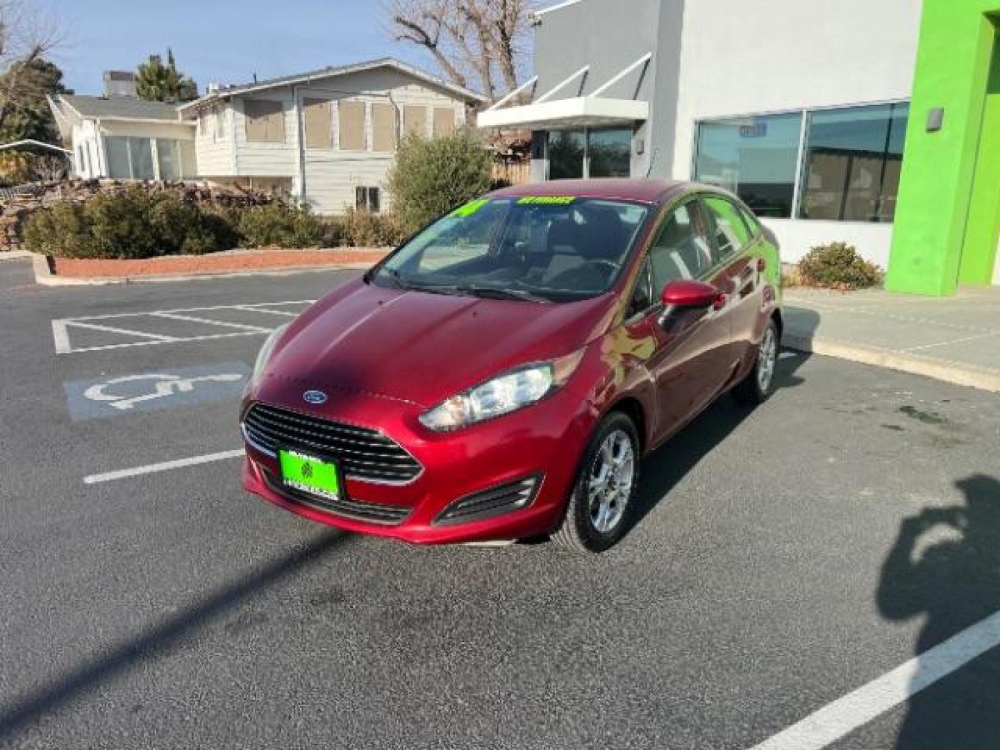 2014 Ruby Red Met Tinted CC /Charcoal Black w/Silver Ford Fiesta SE Sedan (3FADP4BJ1EM) with an 1.6L L4 DOHC 16V engine, 6-Speed Automatic transmission, located at 1865 East Red Hills Pkwy, St. George, 84770, (435) 628-0023, 37.120850, -113.543640 - We specialize in helping ALL people get the best financing available. No matter your credit score, good, bad or none we can get you an amazing rate. Had a bankruptcy, divorce, or repossessions? We give you the green light to get your credit back on the road. Low down and affordable payments that fit - Photo#2