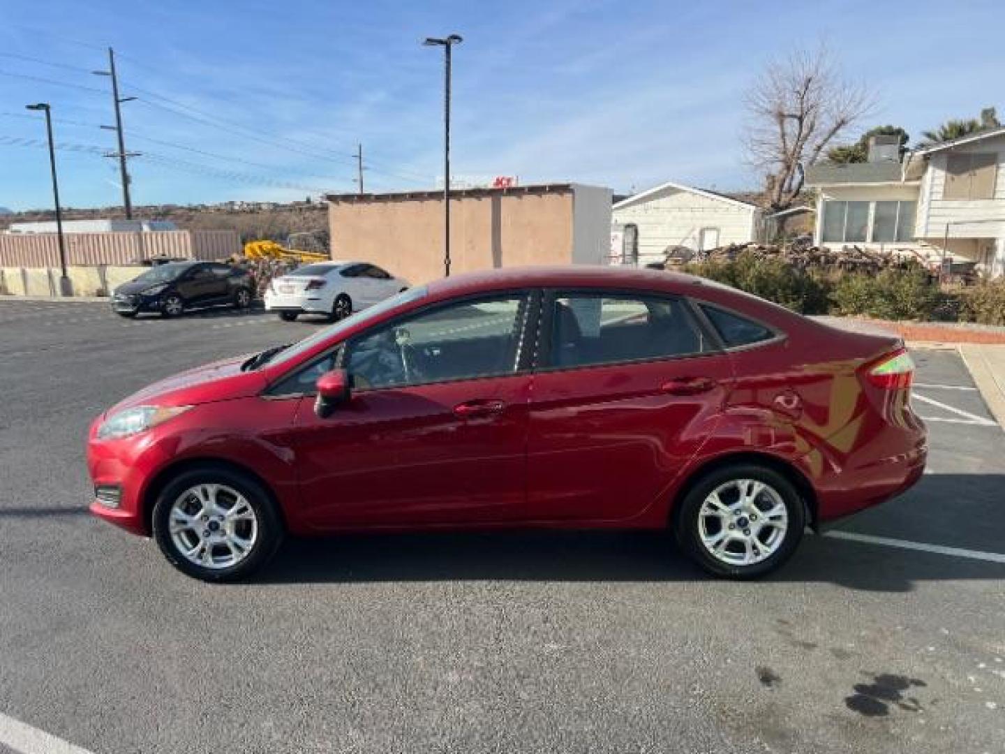 2014 Ruby Red Met Tinted CC /Charcoal Black w/Silver Ford Fiesta SE Sedan (3FADP4BJ1EM) with an 1.6L L4 DOHC 16V engine, 6-Speed Automatic transmission, located at 1865 East Red Hills Pkwy, St. George, 84770, (435) 628-0023, 37.120850, -113.543640 - We specialize in helping ALL people get the best financing available. No matter your credit score, good, bad or none we can get you an amazing rate. Had a bankruptcy, divorce, or repossessions? We give you the green light to get your credit back on the road. Low down and affordable payments that fit - Photo#3