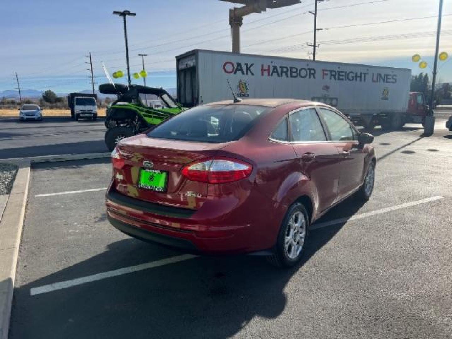 2014 Ruby Red Met Tinted CC /Charcoal Black w/Silver Ford Fiesta SE Sedan (3FADP4BJ1EM) with an 1.6L L4 DOHC 16V engine, 6-Speed Automatic transmission, located at 1865 East Red Hills Pkwy, St. George, 84770, (435) 628-0023, 37.120850, -113.543640 - We specialize in helping ALL people get the best financing available. No matter your credit score, good, bad or none we can get you an amazing rate. Had a bankruptcy, divorce, or repossessions? We give you the green light to get your credit back on the road. Low down and affordable payments that fit - Photo#6