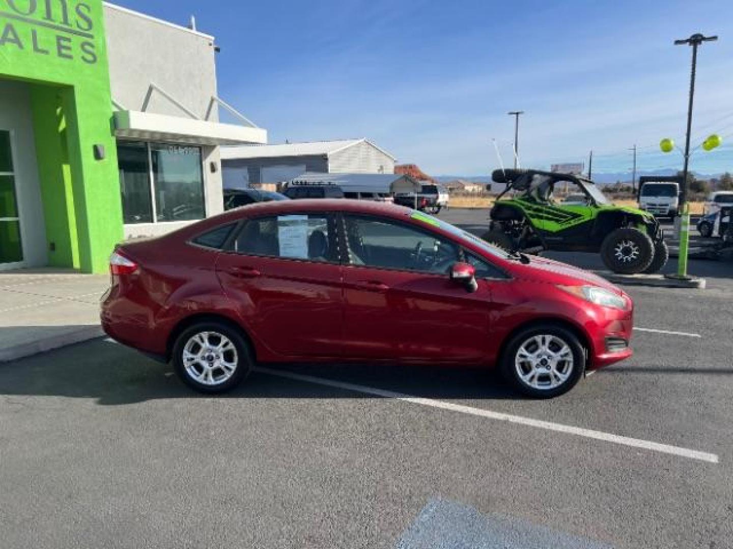 2014 Ruby Red Met Tinted CC /Charcoal Black w/Silver Ford Fiesta SE Sedan (3FADP4BJ1EM) with an 1.6L L4 DOHC 16V engine, 6-Speed Automatic transmission, located at 1865 East Red Hills Pkwy, St. George, 84770, (435) 628-0023, 37.120850, -113.543640 - We specialize in helping ALL people get the best financing available. No matter your credit score, good, bad or none we can get you an amazing rate. Had a bankruptcy, divorce, or repossessions? We give you the green light to get your credit back on the road. Low down and affordable payments that fit - Photo#7