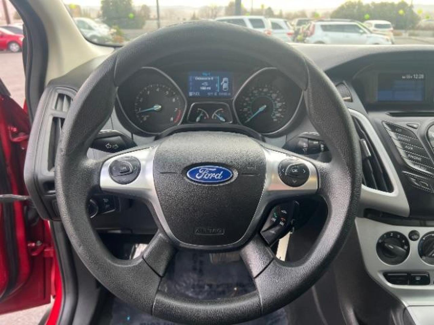 2012 Race Red /Charcoal Black/Metal Gray Cloth Interior Ford Focus SE (1FAHP3K22CL) with an 2.0L L4 DOHC 16V engine, located at 1865 East Red Hills Pkwy, St. George, 84770, (435) 628-0023, 37.120850, -113.543640 - Photo#15