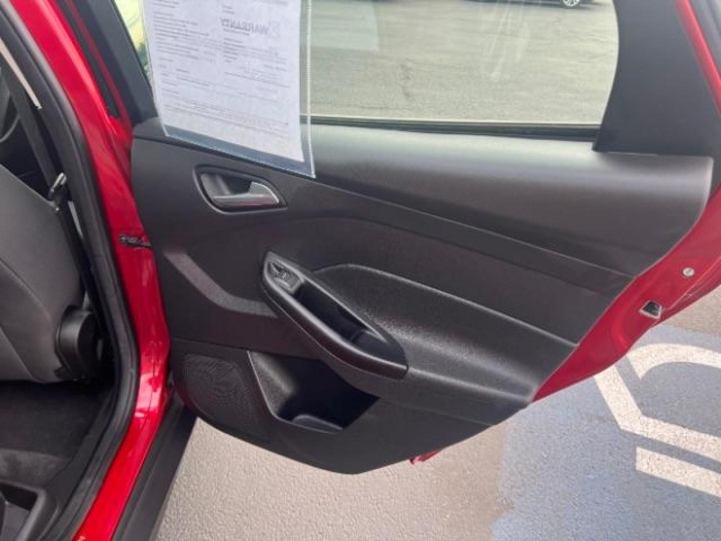 2012 Race Red /Charcoal Black/Metal Gray Cloth Interior Ford Focus SE (1FAHP3K22CL) with an 2.0L L4 DOHC 16V engine, located at 1865 East Red Hills Pkwy, St. George, 84770, (435) 628-0023, 37.120850, -113.543640 - Photo#28