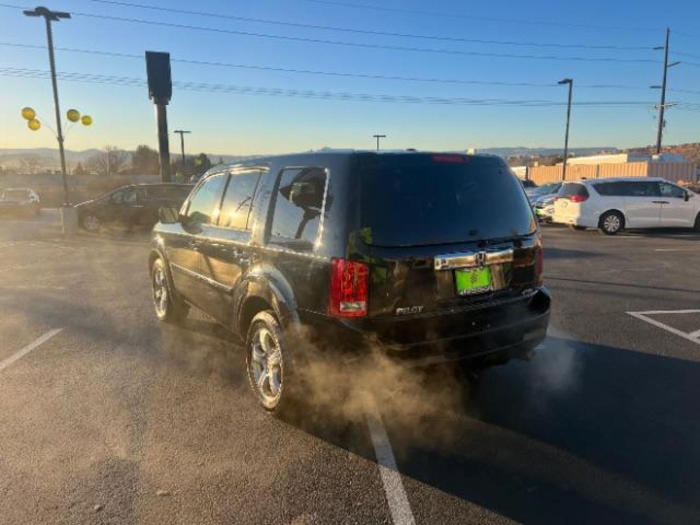 2013 Crystal Black Pearl /Beige Leather Interior Honda Pilot EX-L 4WD 5-Spd AT with Navigation (5FNYF4H79DB) with an 3.5L V6 SOHC 24V engine, 5-Speed Automatic transmission, located at 940 North Main Street, Cedar City, UT, 84720, (435) 628-0023, 37.692936, -113.061897 - We specialize in helping ALL people get the best financing available. No matter your credit score, good, bad or none we can get you an amazing rate. Had a bankruptcy, divorce, or repossessions? We give you the green light to get your credit back on the road. Low down and affordable payments that fit - Photo#4