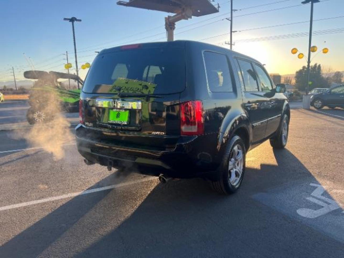 2013 Crystal Black Pearl /Beige Leather Interior Honda Pilot EX-L 4WD 5-Spd AT with Navigation (5FNYF4H79DB) with an 3.5L V6 SOHC 24V engine, 5-Speed Automatic transmission, located at 940 North Main Street, Cedar City, UT, 84720, (435) 628-0023, 37.692936, -113.061897 - We specialize in helping ALL people get the best financing available. No matter your credit score, good, bad or none we can get you an amazing rate. Had a bankruptcy, divorce, or repossessions? We give you the green light to get your credit back on the road. Low down and affordable payments that fit - Photo#6