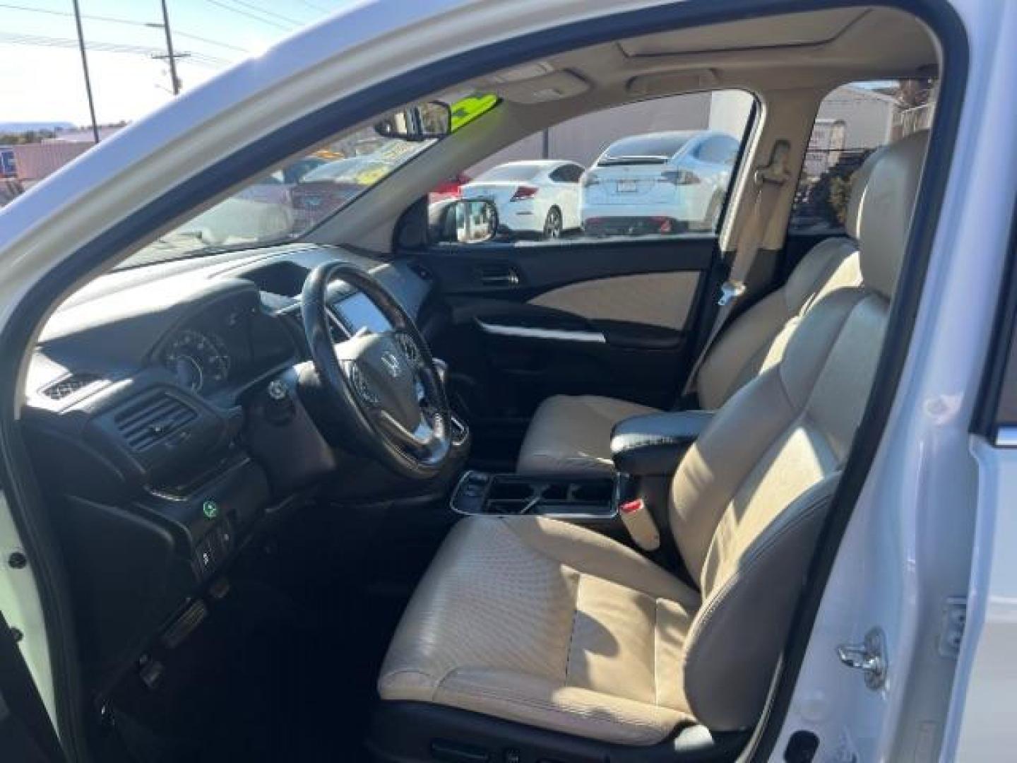 2015 WHITE /BLACK HONDA CR-V EX-L EX-L (5J6RM4H77FL) with an 4 CYL engine, AUTOMATIC transmission, located at 1865 East Red Hills Pkwy, St. George, 84770, (435) 628-0023, 37.120850, -113.543640 - We specialize in helping ALL people get the best financing available. No matter your credit score, good, bad or none we can get you an amazing rate. Had a bankruptcy, divorce, or repossessions? We give you the green light to get your credit back on the road. Low down and affordable payments that fit - Photo#13