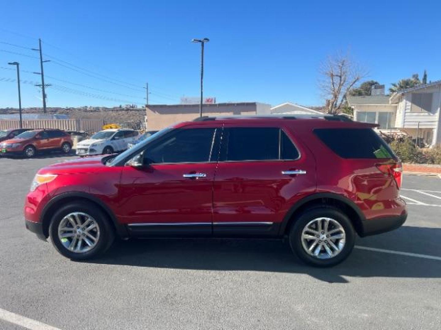 2014 Ruby Red Met Tinted CC /Charcoal Black Ford Explorer XLT FWD (1FM5K7D87EG) with an 3.5L V6 DOHC 24V engine, 6-Speed Automatic transmission, located at 940 North Main Street, Cedar City, UT, 84720, (435) 628-0023, 37.692936, -113.061897 - We specialize in helping ALL people get the best financing available. No matter your credit score, good, bad or none we can get you an amazing rate. Had a bankruptcy, divorce, or repossessions? We give you the green light to get your credit back on the road. Low down and affordable payments that fit - Photo#3