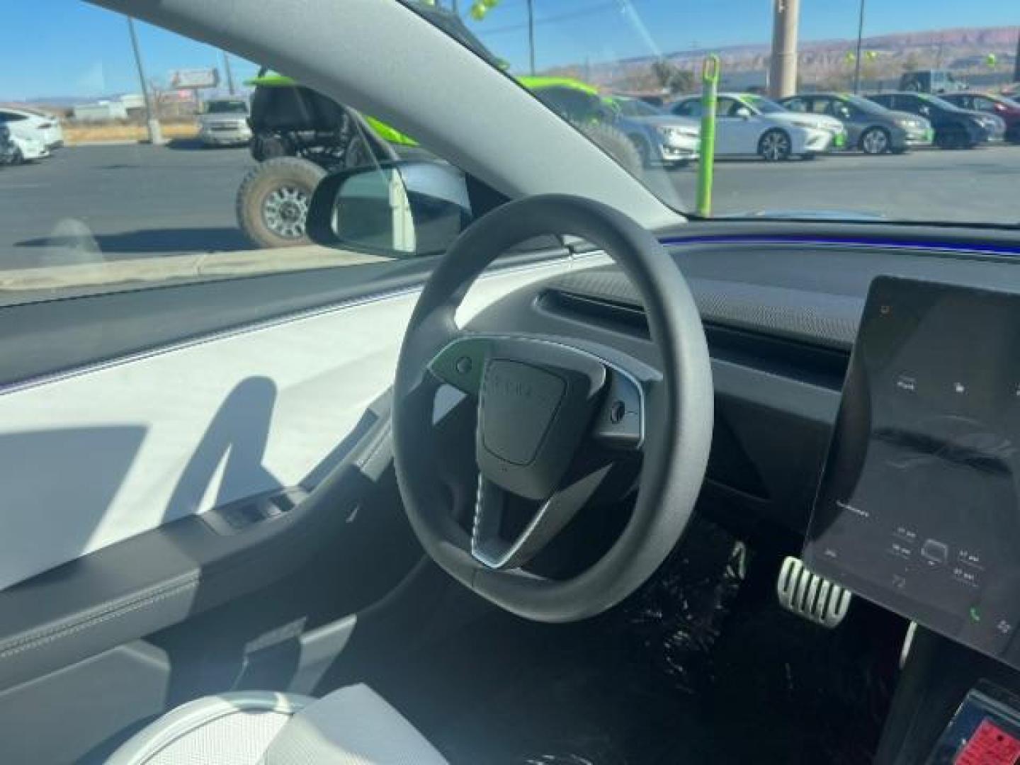 2024 Stealth Gray /Black and White Tesla Model 3 Plaid (5YJ3E1ET4RF) with an ELECTRIC engine, 1-Speed Automatic transmission, located at 1865 East Red Hills Pkwy, St. George, 84770, (435) 628-0023, 37.120850, -113.543640 - Experience the exhilarating performance of the near-new, redesigned 2024 Tesla Model 3 Performance. This high-performance sedan boasts 510 horsepower, accelerating from 0 to 60 mph in just 2.9 seconds, with a top speed of 163 mph. Equipped with adaptive suspension and track mode, it offers a dynamic - Photo#30