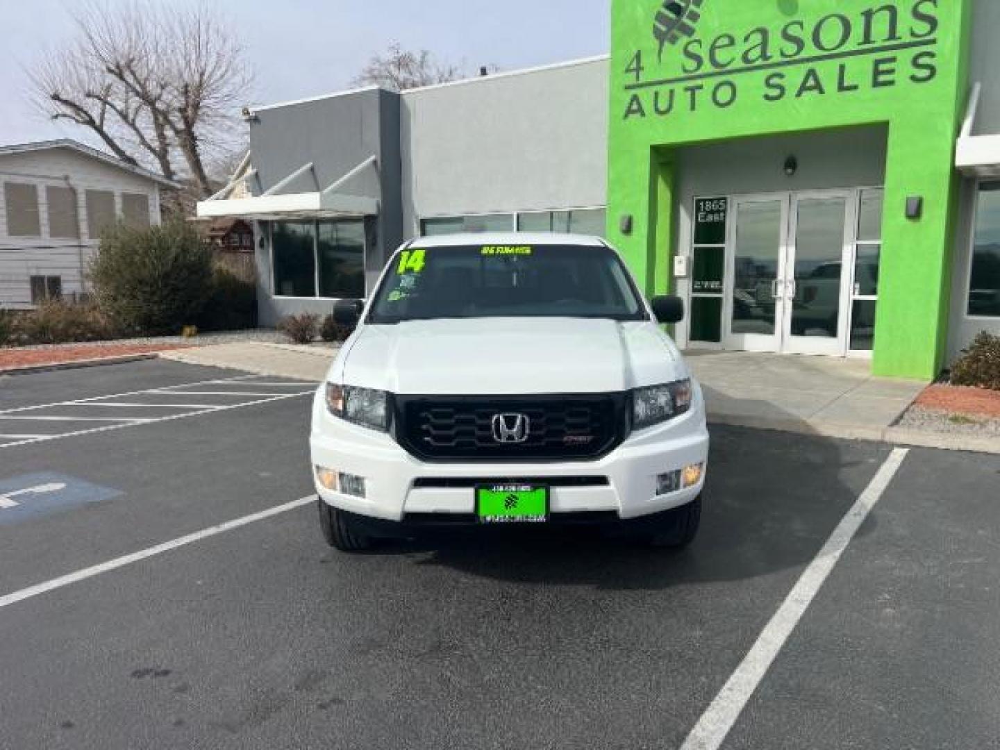 2014 White /Black Honda Ridgeline Sport (5FPYK1F75EB) with an 3.5L V6 SOHC 24V engine, 5-Speed Automatic transmission, located at 940 North Main Street, Cedar City, UT, 84720, (435) 628-0023, 37.692936, -113.061897 - We specialize in helping ALL people get the best financing available. No matter your credit score, good, bad or none we can get you an amazing rate. Had a bankruptcy, divorce, or repossessions? We give you the green light to get your credit back on the road. Low down and affordable payments that fit - Photo#1