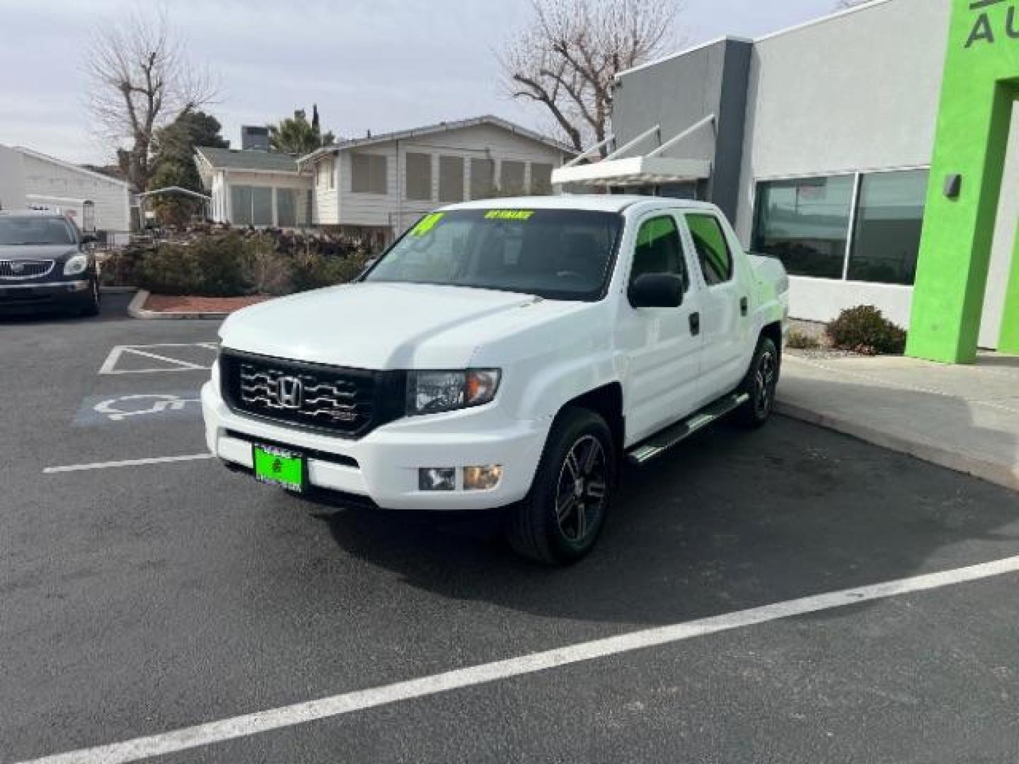 2014 White /Black Honda Ridgeline Sport (5FPYK1F75EB) with an 3.5L V6 SOHC 24V engine, 5-Speed Automatic transmission, located at 940 North Main Street, Cedar City, UT, 84720, (435) 628-0023, 37.692936, -113.061897 - We specialize in helping ALL people get the best financing available. No matter your credit score, good, bad or none we can get you an amazing rate. Had a bankruptcy, divorce, or repossessions? We give you the green light to get your credit back on the road. Low down and affordable payments that fit - Photo#2