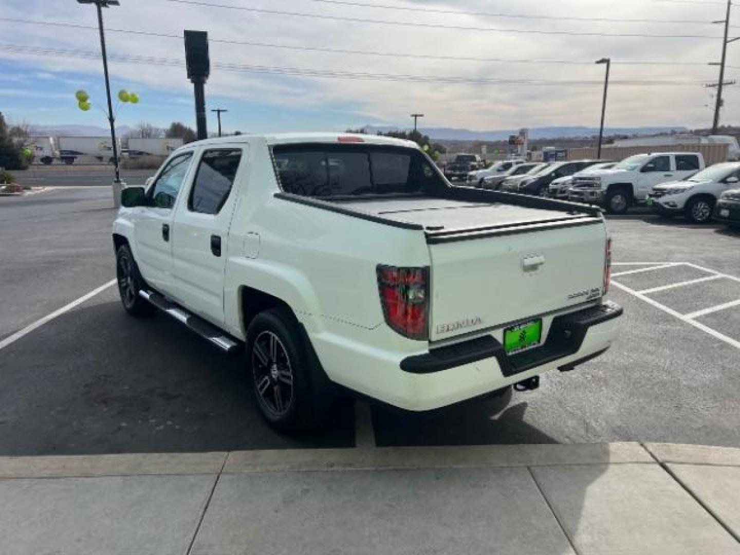 2014 White /Black Honda Ridgeline Sport (5FPYK1F75EB) with an 3.5L V6 SOHC 24V engine, 5-Speed Automatic transmission, located at 940 North Main Street, Cedar City, UT, 84720, (435) 628-0023, 37.692936, -113.061897 - We specialize in helping ALL people get the best financing available. No matter your credit score, good, bad or none we can get you an amazing rate. Had a bankruptcy, divorce, or repossessions? We give you the green light to get your credit back on the road. Low down and affordable payments that fit - Photo#4