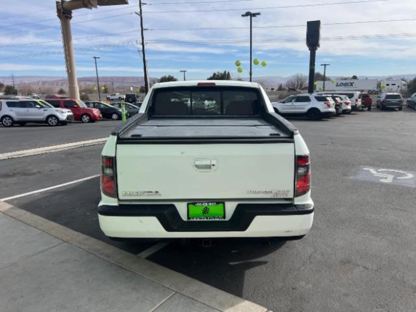 2014 White /Black Honda Ridgeline Sport (5FPYK1F75EB) with an 3.5L V6 SOHC 24V engine, 5-Speed Automatic transmission, located at 940 North Main Street, Cedar City, UT, 84720, (435) 628-0023, 37.692936, -113.061897 - We specialize in helping ALL people get the best financing available. No matter your credit score, good, bad or none we can get you an amazing rate. Had a bankruptcy, divorce, or repossessions? We give you the green light to get your credit back on the road. Low down and affordable payments that fit - Photo#5