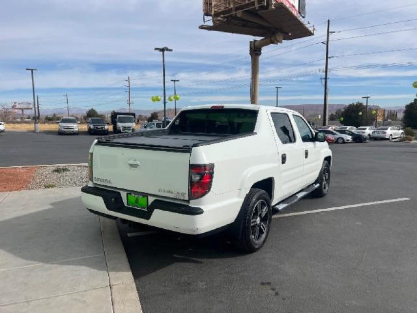 2014 White /Black Honda Ridgeline Sport (5FPYK1F75EB) with an 3.5L V6 SOHC 24V engine, 5-Speed Automatic transmission, located at 940 North Main Street, Cedar City, UT, 84720, (435) 628-0023, 37.692936, -113.061897 - We specialize in helping ALL people get the best financing available. No matter your credit score, good, bad or none we can get you an amazing rate. Had a bankruptcy, divorce, or repossessions? We give you the green light to get your credit back on the road. Low down and affordable payments that fit - Photo#6