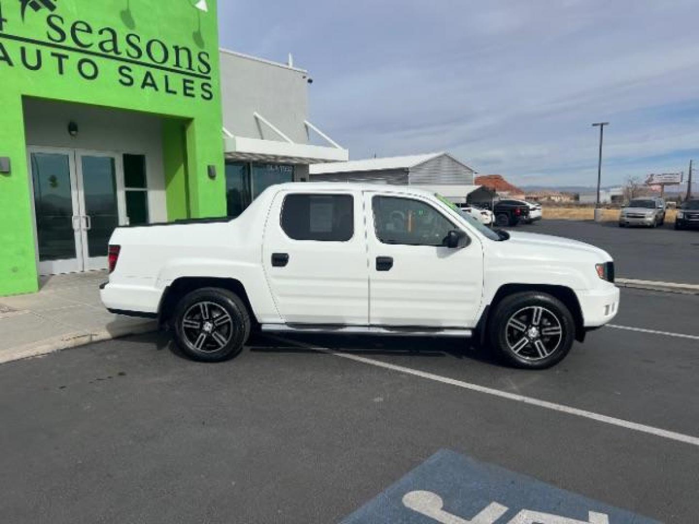 2014 White /Black Honda Ridgeline Sport (5FPYK1F75EB) with an 3.5L V6 SOHC 24V engine, 5-Speed Automatic transmission, located at 940 North Main Street, Cedar City, UT, 84720, (435) 628-0023, 37.692936, -113.061897 - We specialize in helping ALL people get the best financing available. No matter your credit score, good, bad or none we can get you an amazing rate. Had a bankruptcy, divorce, or repossessions? We give you the green light to get your credit back on the road. Low down and affordable payments that fit - Photo#7