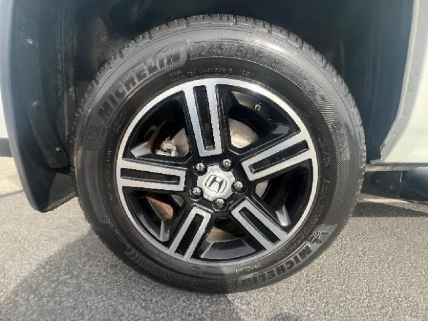 2014 White /Black Honda Ridgeline Sport (5FPYK1F75EB) with an 3.5L V6 SOHC 24V engine, 5-Speed Automatic transmission, located at 940 North Main Street, Cedar City, UT, 84720, (435) 628-0023, 37.692936, -113.061897 - We specialize in helping ALL people get the best financing available. No matter your credit score, good, bad or none we can get you an amazing rate. Had a bankruptcy, divorce, or repossessions? We give you the green light to get your credit back on the road. Low down and affordable payments that fit - Photo#8