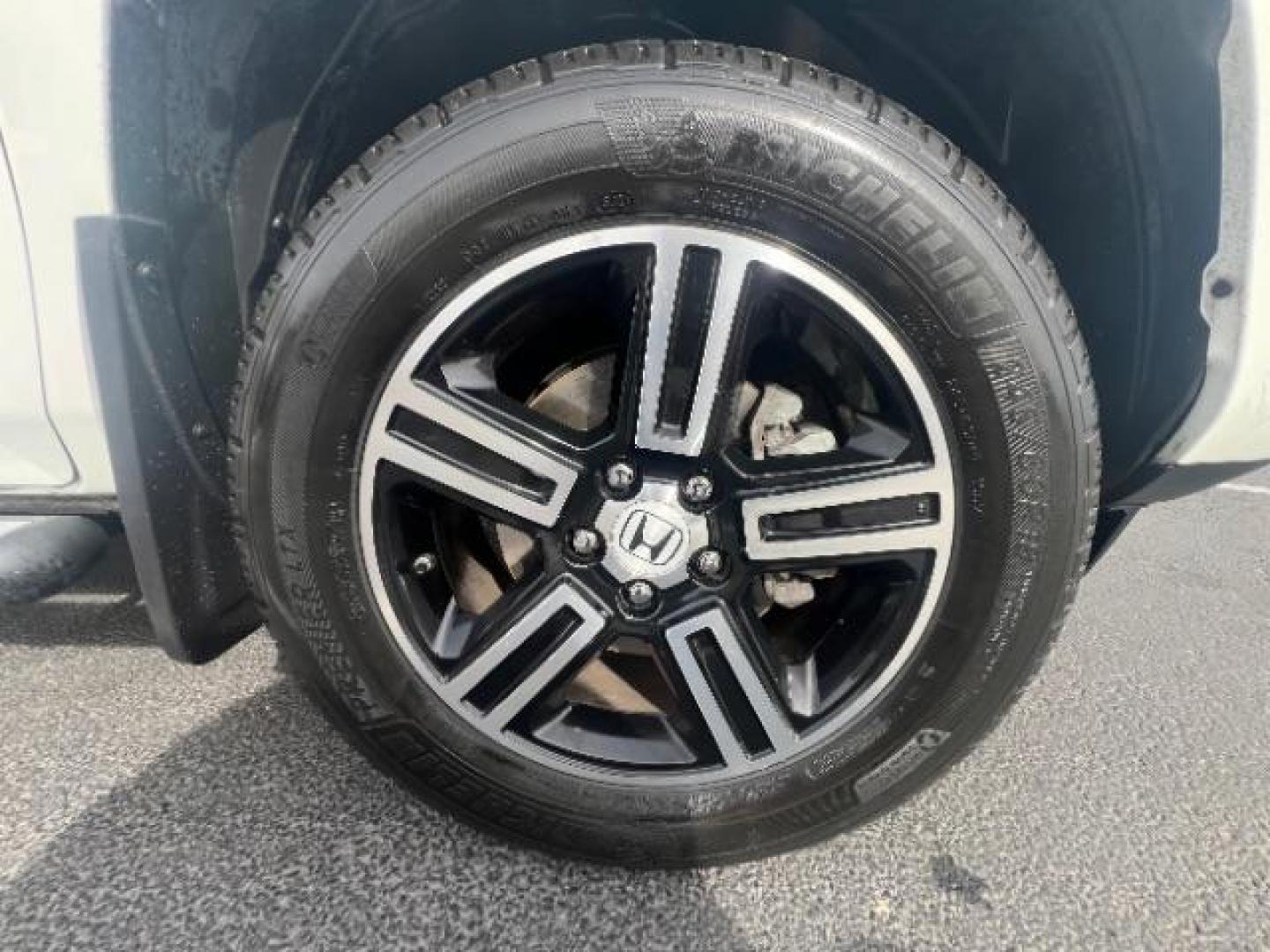 2014 White /Black Honda Ridgeline Sport (5FPYK1F75EB) with an 3.5L V6 SOHC 24V engine, 5-Speed Automatic transmission, located at 940 North Main Street, Cedar City, UT, 84720, (435) 628-0023, 37.692936, -113.061897 - We specialize in helping ALL people get the best financing available. No matter your credit score, good, bad or none we can get you an amazing rate. Had a bankruptcy, divorce, or repossessions? We give you the green light to get your credit back on the road. Low down and affordable payments that fit - Photo#9