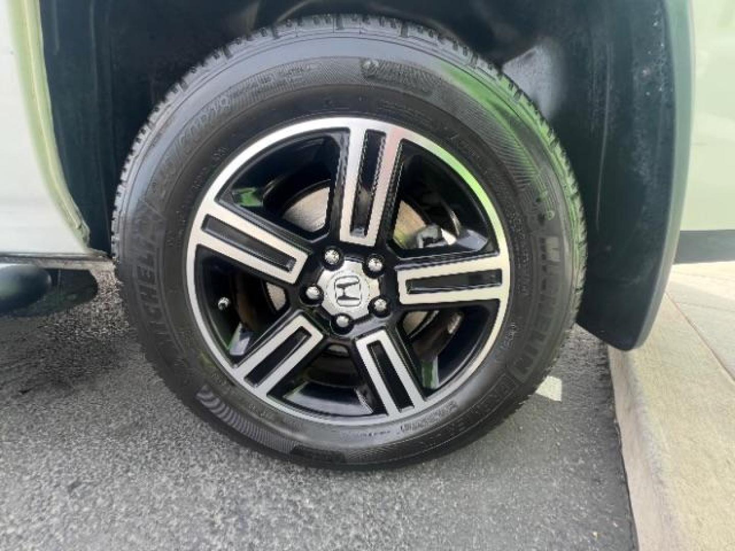 2014 White /Black Honda Ridgeline Sport (5FPYK1F75EB) with an 3.5L V6 SOHC 24V engine, 5-Speed Automatic transmission, located at 940 North Main Street, Cedar City, UT, 84720, (435) 628-0023, 37.692936, -113.061897 - We specialize in helping ALL people get the best financing available. No matter your credit score, good, bad or none we can get you an amazing rate. Had a bankruptcy, divorce, or repossessions? We give you the green light to get your credit back on the road. Low down and affordable payments that fit - Photo#11