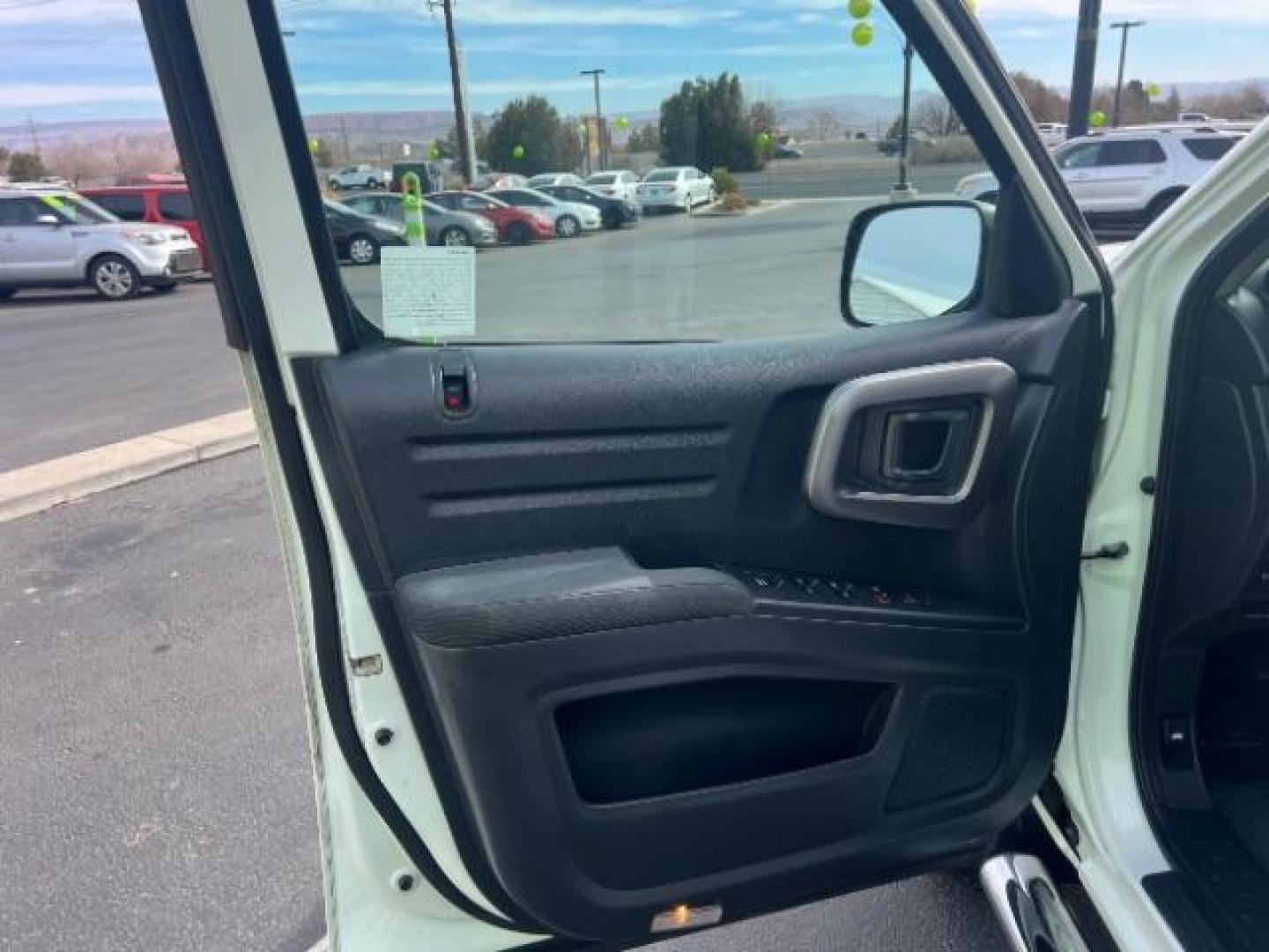 2014 White /Black Honda Ridgeline Sport (5FPYK1F75EB) with an 3.5L V6 SOHC 24V engine, 5-Speed Automatic transmission, located at 940 North Main Street, Cedar City, UT, 84720, (435) 628-0023, 37.692936, -113.061897 - We specialize in helping ALL people get the best financing available. No matter your credit score, good, bad or none we can get you an amazing rate. Had a bankruptcy, divorce, or repossessions? We give you the green light to get your credit back on the road. Low down and affordable payments that fit - Photo#12