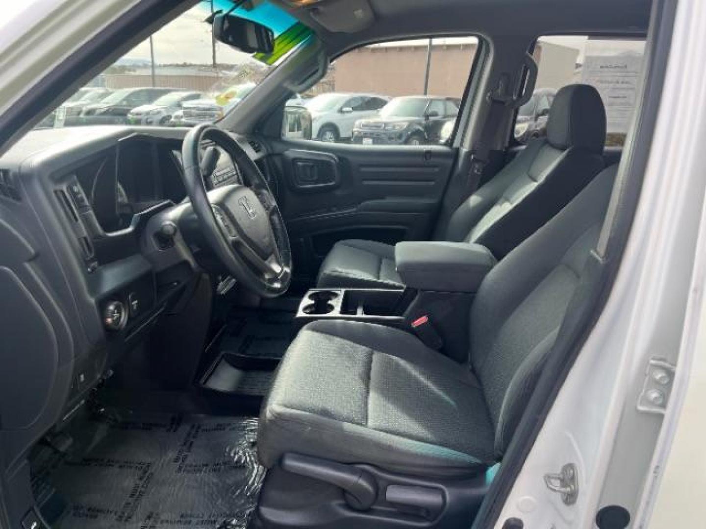 2014 White /Black Honda Ridgeline Sport (5FPYK1F75EB) with an 3.5L V6 SOHC 24V engine, 5-Speed Automatic transmission, located at 940 North Main Street, Cedar City, UT, 84720, (435) 628-0023, 37.692936, -113.061897 - We specialize in helping ALL people get the best financing available. No matter your credit score, good, bad or none we can get you an amazing rate. Had a bankruptcy, divorce, or repossessions? We give you the green light to get your credit back on the road. Low down and affordable payments that fit - Photo#14