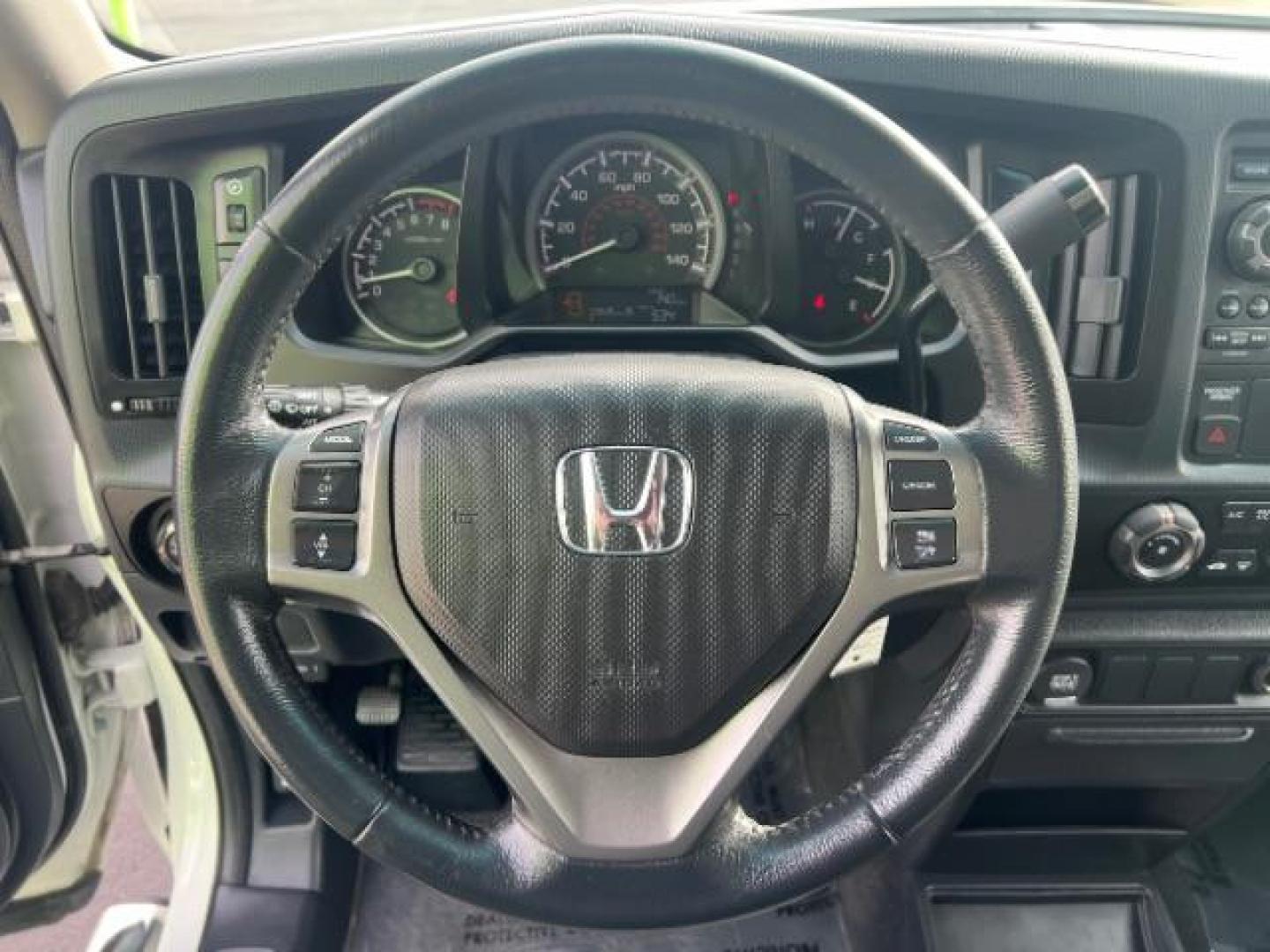 2014 White /Black Honda Ridgeline Sport (5FPYK1F75EB) with an 3.5L V6 SOHC 24V engine, 5-Speed Automatic transmission, located at 940 North Main Street, Cedar City, UT, 84720, (435) 628-0023, 37.692936, -113.061897 - We specialize in helping ALL people get the best financing available. No matter your credit score, good, bad or none we can get you an amazing rate. Had a bankruptcy, divorce, or repossessions? We give you the green light to get your credit back on the road. Low down and affordable payments that fit - Photo#16