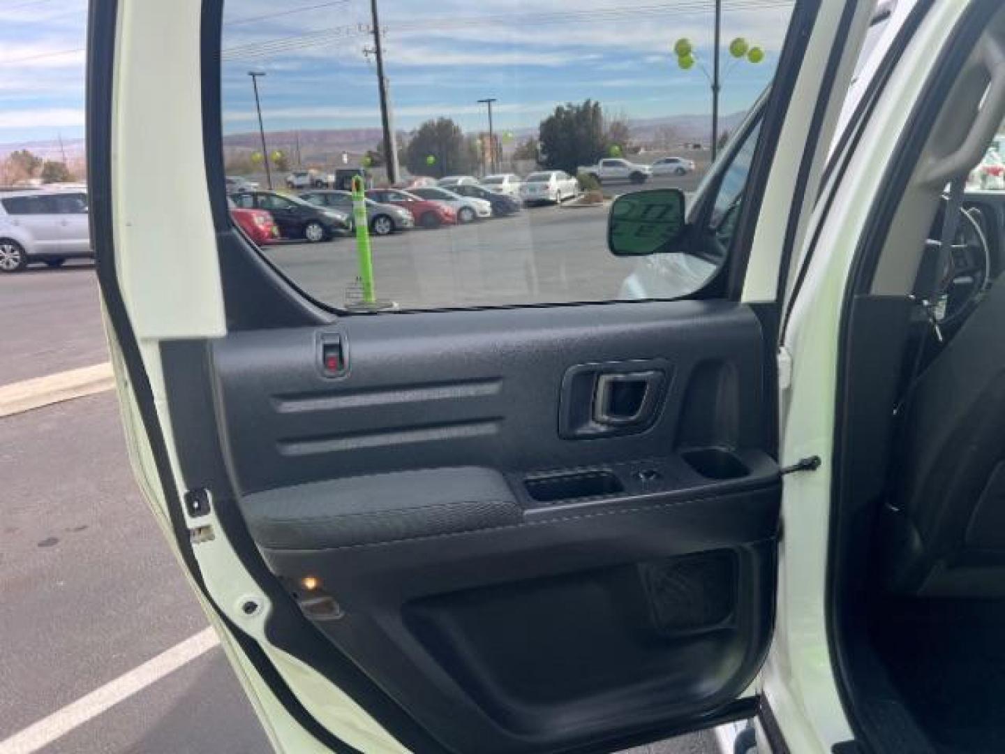 2014 White /Black Honda Ridgeline Sport (5FPYK1F75EB) with an 3.5L V6 SOHC 24V engine, 5-Speed Automatic transmission, located at 940 North Main Street, Cedar City, UT, 84720, (435) 628-0023, 37.692936, -113.061897 - We specialize in helping ALL people get the best financing available. No matter your credit score, good, bad or none we can get you an amazing rate. Had a bankruptcy, divorce, or repossessions? We give you the green light to get your credit back on the road. Low down and affordable payments that fit - Photo#20