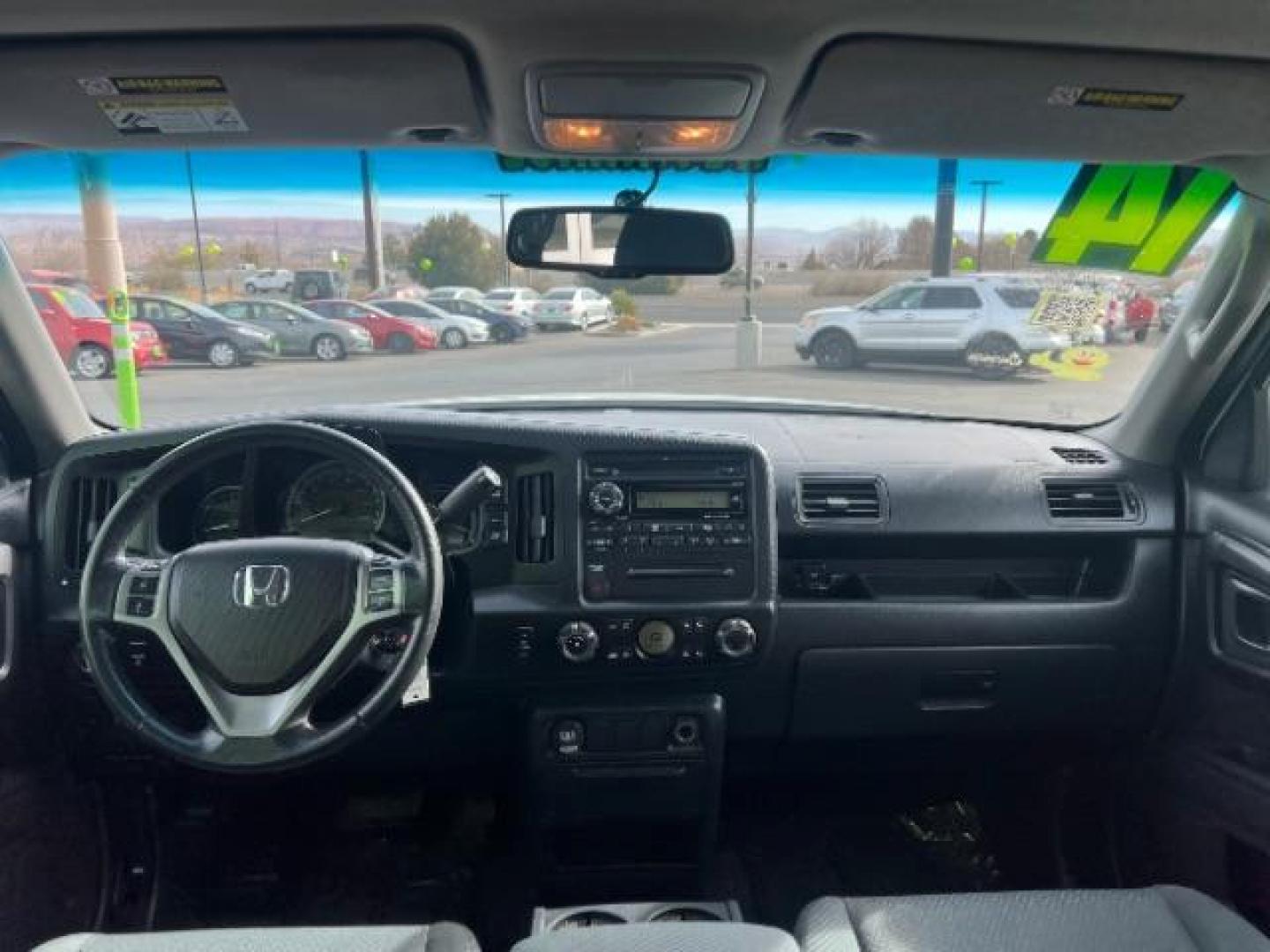 2014 White /Black Honda Ridgeline Sport (5FPYK1F75EB) with an 3.5L V6 SOHC 24V engine, 5-Speed Automatic transmission, located at 940 North Main Street, Cedar City, UT, 84720, (435) 628-0023, 37.692936, -113.061897 - We specialize in helping ALL people get the best financing available. No matter your credit score, good, bad or none we can get you an amazing rate. Had a bankruptcy, divorce, or repossessions? We give you the green light to get your credit back on the road. Low down and affordable payments that fit - Photo#23