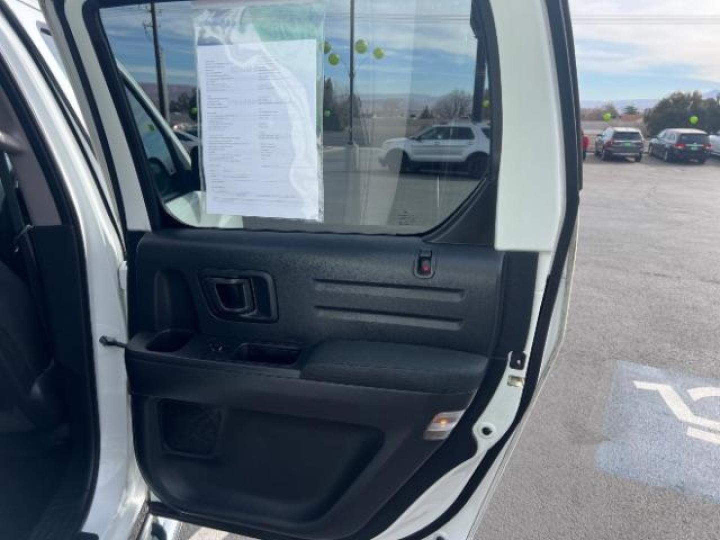 2014 White /Black Honda Ridgeline Sport (5FPYK1F75EB) with an 3.5L V6 SOHC 24V engine, 5-Speed Automatic transmission, located at 940 North Main Street, Cedar City, UT, 84720, (435) 628-0023, 37.692936, -113.061897 - We specialize in helping ALL people get the best financing available. No matter your credit score, good, bad or none we can get you an amazing rate. Had a bankruptcy, divorce, or repossessions? We give you the green light to get your credit back on the road. Low down and affordable payments that fit - Photo#25