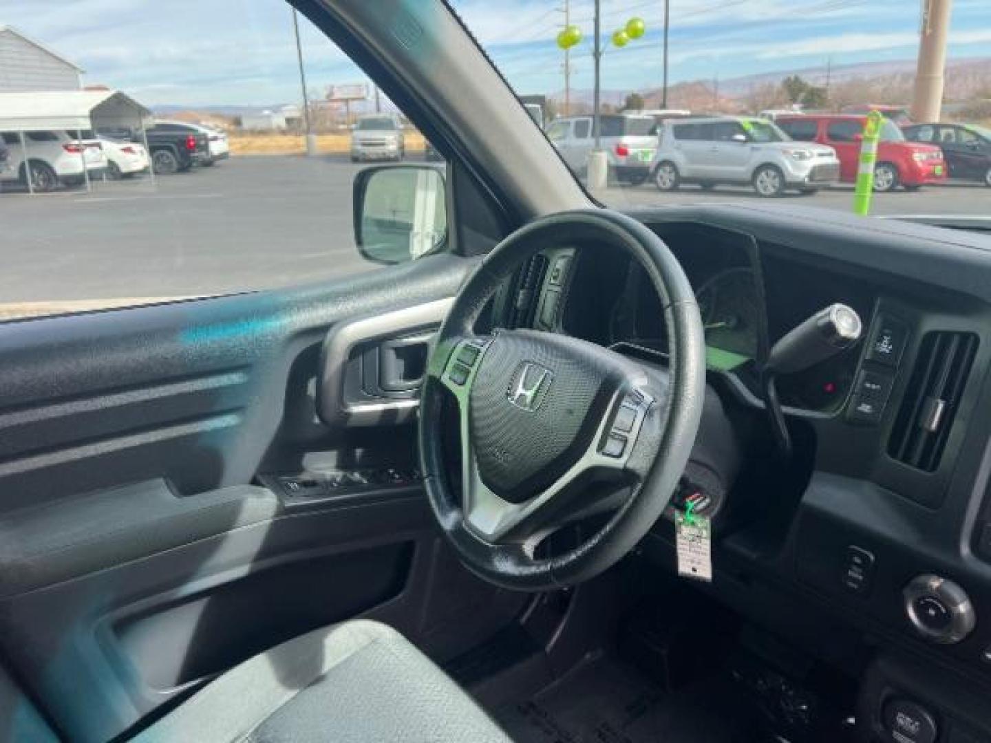 2014 White /Black Honda Ridgeline Sport (5FPYK1F75EB) with an 3.5L V6 SOHC 24V engine, 5-Speed Automatic transmission, located at 940 North Main Street, Cedar City, UT, 84720, (435) 628-0023, 37.692936, -113.061897 - We specialize in helping ALL people get the best financing available. No matter your credit score, good, bad or none we can get you an amazing rate. Had a bankruptcy, divorce, or repossessions? We give you the green light to get your credit back on the road. Low down and affordable payments that fit - Photo#30