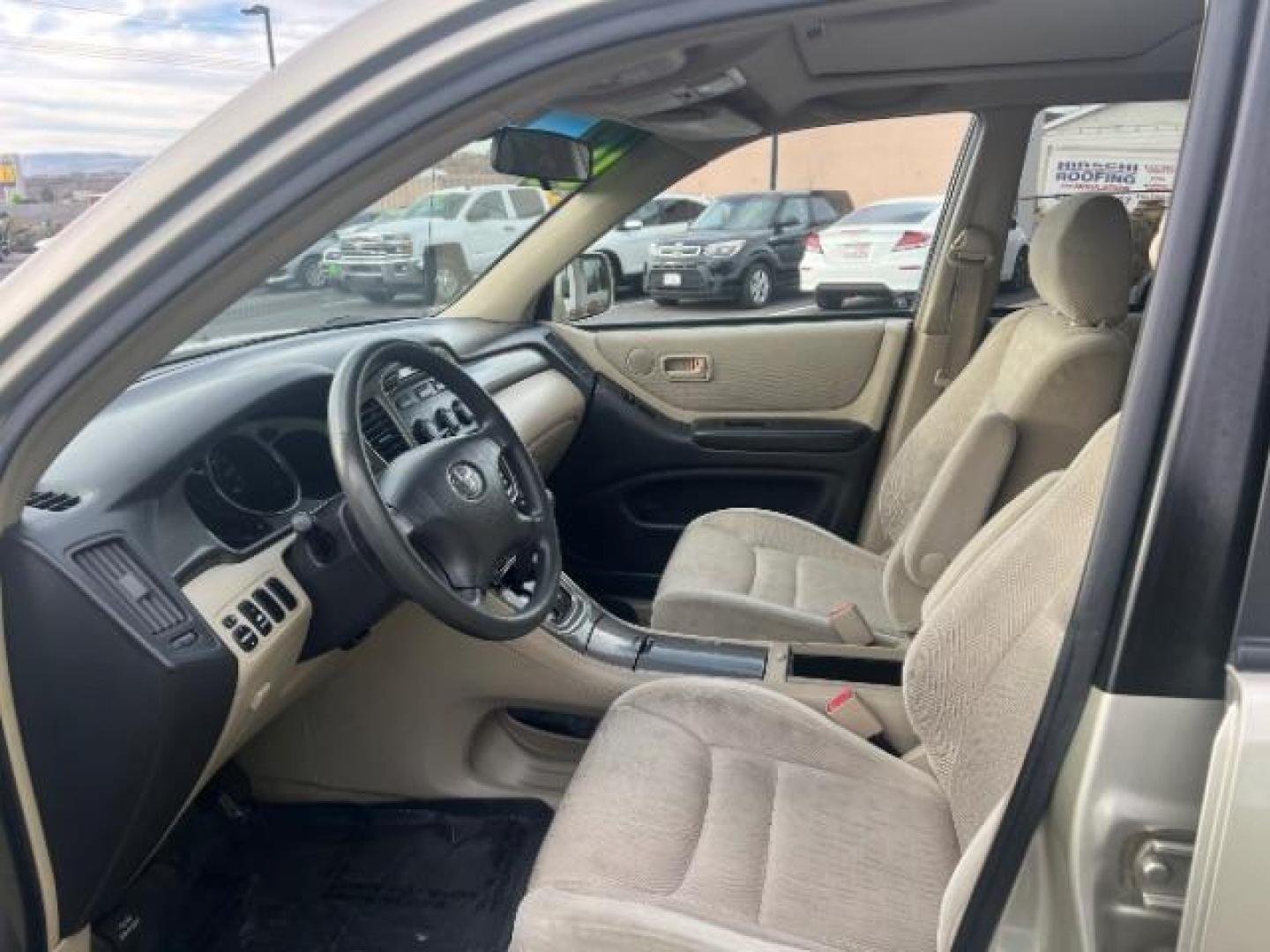 2003 Vintage Gold Metallic /Ivory Cloth Interior Trim Toyota Highlander V6 2WD (JTEGF21A830) with an 3.0L V6 DOHC 24V engine, 4-Speed Automatic transmission, located at 1865 East Red Hills Pkwy, St. George, 84770, (435) 628-0023, 37.120850, -113.543640 - We specialize in helping ALL people get the best financing available. No matter your credit score, good, bad or none we can get you an amazing rate. Had a bankruptcy, divorce, or repossessions? We give you the green light to get your credit back on the road. Low down and affordable payments that fit - Photo#14