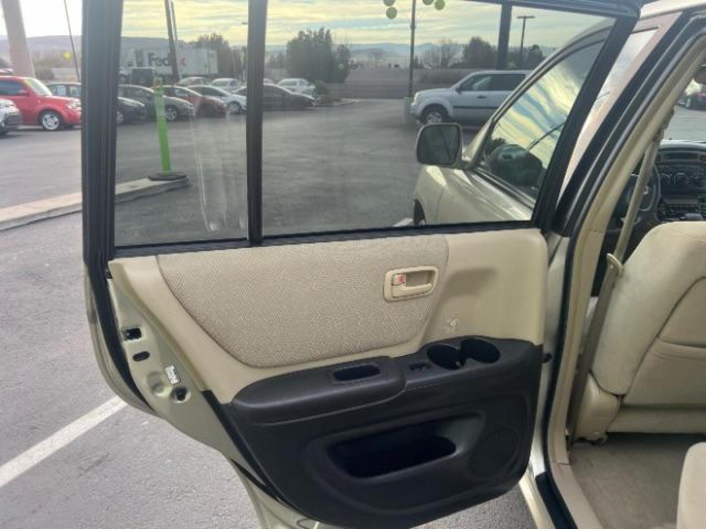 2003 Vintage Gold Metallic /Ivory Cloth Interior Trim Toyota Highlander V6 2WD (JTEGF21A830) with an 3.0L V6 DOHC 24V engine, 4-Speed Automatic transmission, located at 1865 East Red Hills Pkwy, St. George, 84770, (435) 628-0023, 37.120850, -113.543640 - We specialize in helping ALL people get the best financing available. No matter your credit score, good, bad or none we can get you an amazing rate. Had a bankruptcy, divorce, or repossessions? We give you the green light to get your credit back on the road. Low down and affordable payments that fit - Photo#20