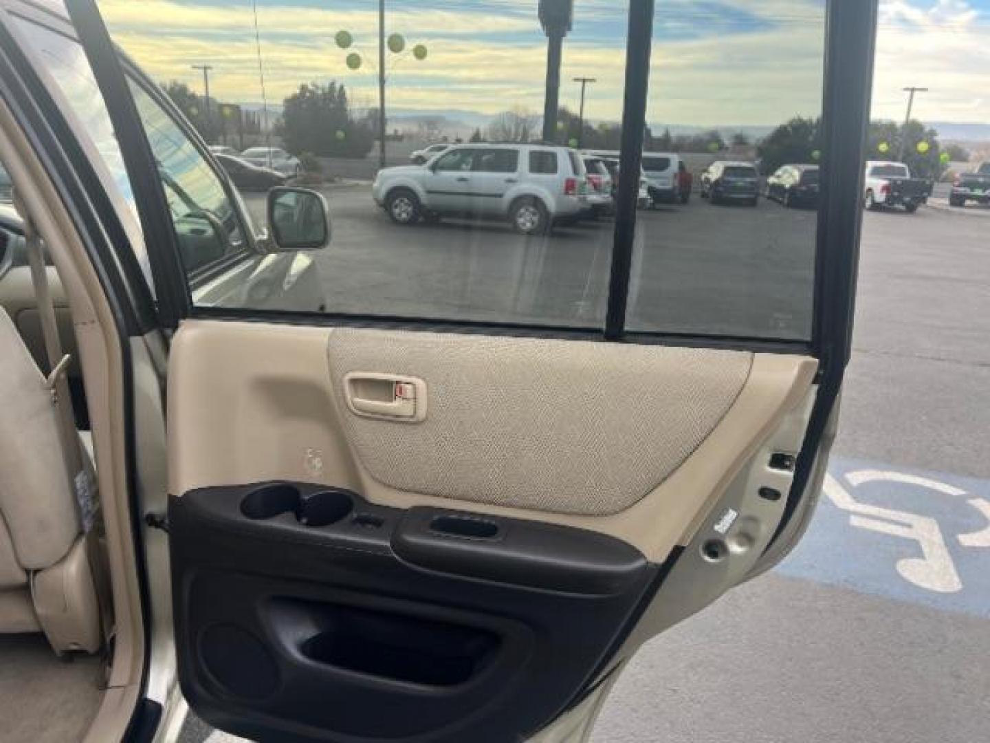 2003 Vintage Gold Metallic /Ivory Cloth Interior Trim Toyota Highlander V6 2WD (JTEGF21A830) with an 3.0L V6 DOHC 24V engine, 4-Speed Automatic transmission, located at 1865 East Red Hills Pkwy, St. George, 84770, (435) 628-0023, 37.120850, -113.543640 - We specialize in helping ALL people get the best financing available. No matter your credit score, good, bad or none we can get you an amazing rate. Had a bankruptcy, divorce, or repossessions? We give you the green light to get your credit back on the road. Low down and affordable payments that fit - Photo#24