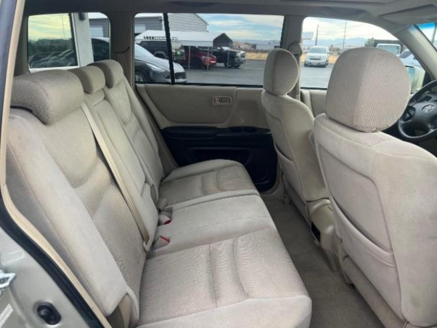 2003 Vintage Gold Metallic /Ivory Cloth Interior Trim Toyota Highlander V6 2WD (JTEGF21A830) with an 3.0L V6 DOHC 24V engine, 4-Speed Automatic transmission, located at 1865 East Red Hills Pkwy, St. George, 84770, (435) 628-0023, 37.120850, -113.543640 - We specialize in helping ALL people get the best financing available. No matter your credit score, good, bad or none we can get you an amazing rate. Had a bankruptcy, divorce, or repossessions? We give you the green light to get your credit back on the road. Low down and affordable payments that fit - Photo#25