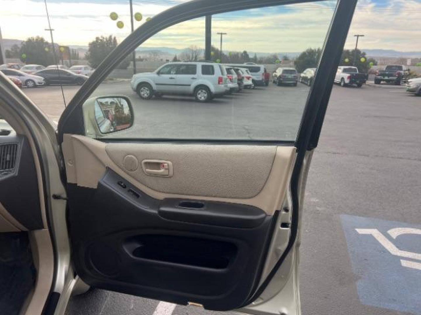 2003 Vintage Gold Metallic /Ivory Cloth Interior Trim Toyota Highlander V6 2WD (JTEGF21A830) with an 3.0L V6 DOHC 24V engine, 4-Speed Automatic transmission, located at 1865 East Red Hills Pkwy, St. George, 84770, (435) 628-0023, 37.120850, -113.543640 - We specialize in helping ALL people get the best financing available. No matter your credit score, good, bad or none we can get you an amazing rate. Had a bankruptcy, divorce, or repossessions? We give you the green light to get your credit back on the road. Low down and affordable payments that fit - Photo#26