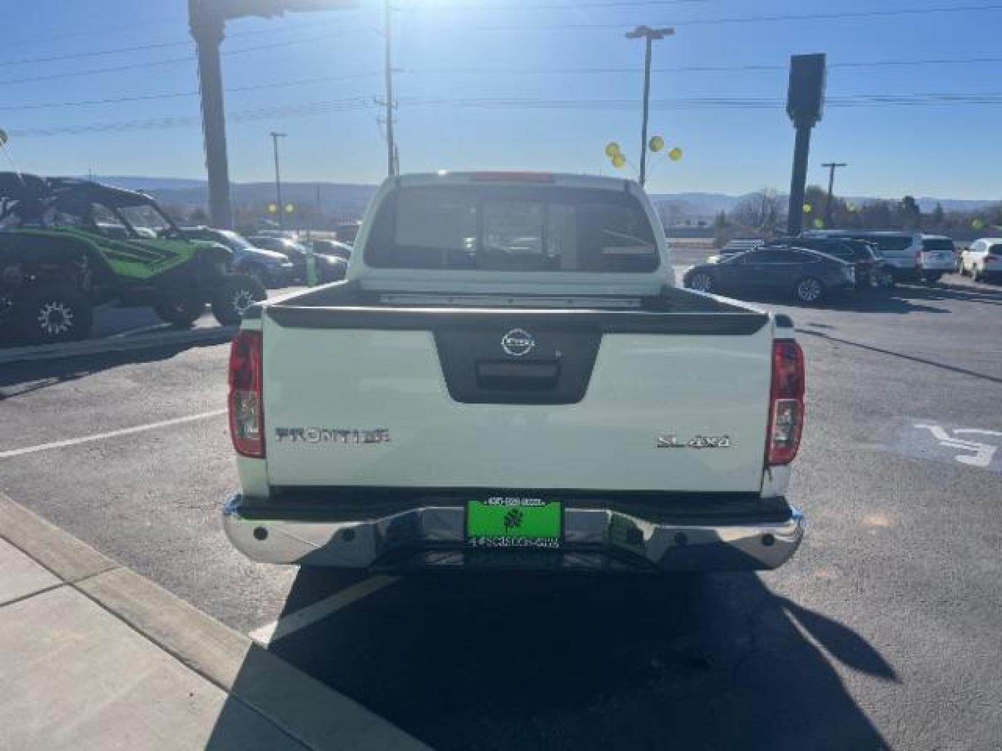 2019 Glacier White /Steel Nissan Frontier SL (1N6AD0EV1KN) with an 4.0L V6 DOHC 24V engine, 5-Speed Automatic transmission, located at 940 North Main Street, Cedar City, UT, 84720, (435) 628-0023, 37.692936, -113.061897 - Photo#5